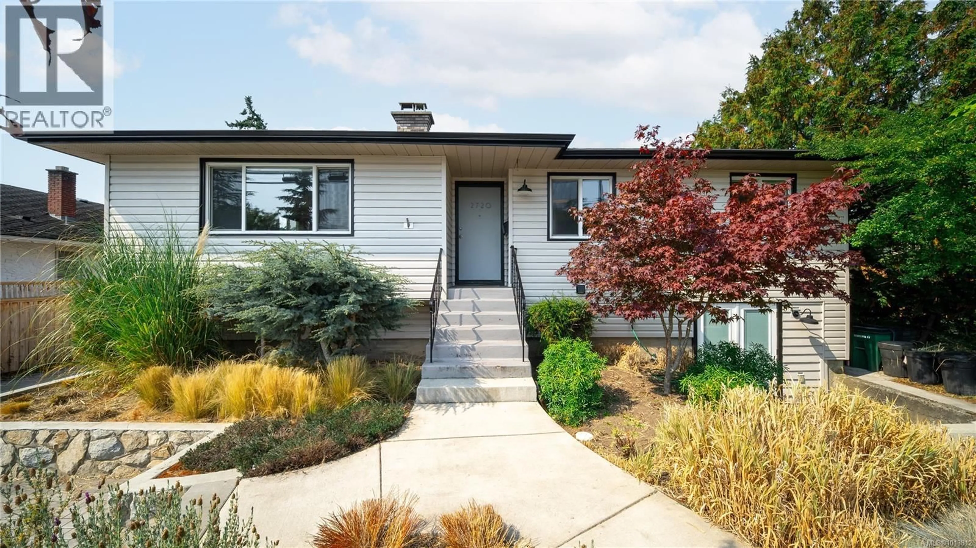 Home with vinyl exterior material, street for 2720 FOUL BAY AVENUE, Saanich British Columbia V8R5B7