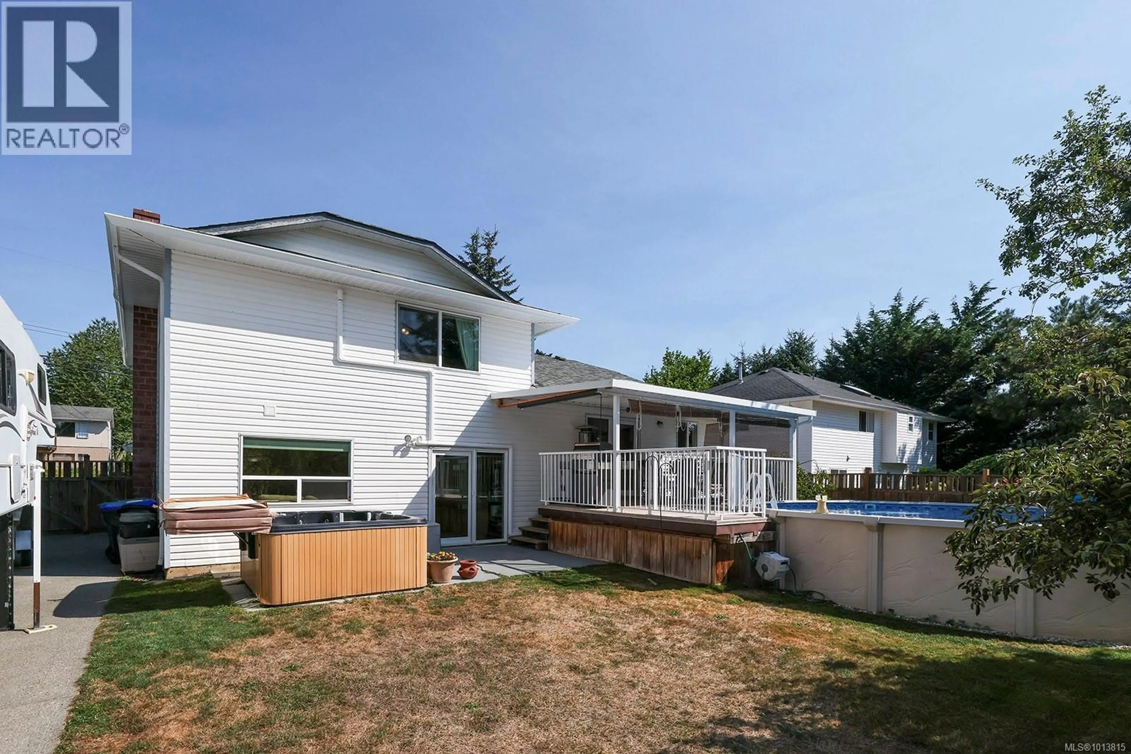 Home with vinyl exterior material, mountain view for 2625 STEWART AVENUE, Courtenay British Columbia V9N7K4