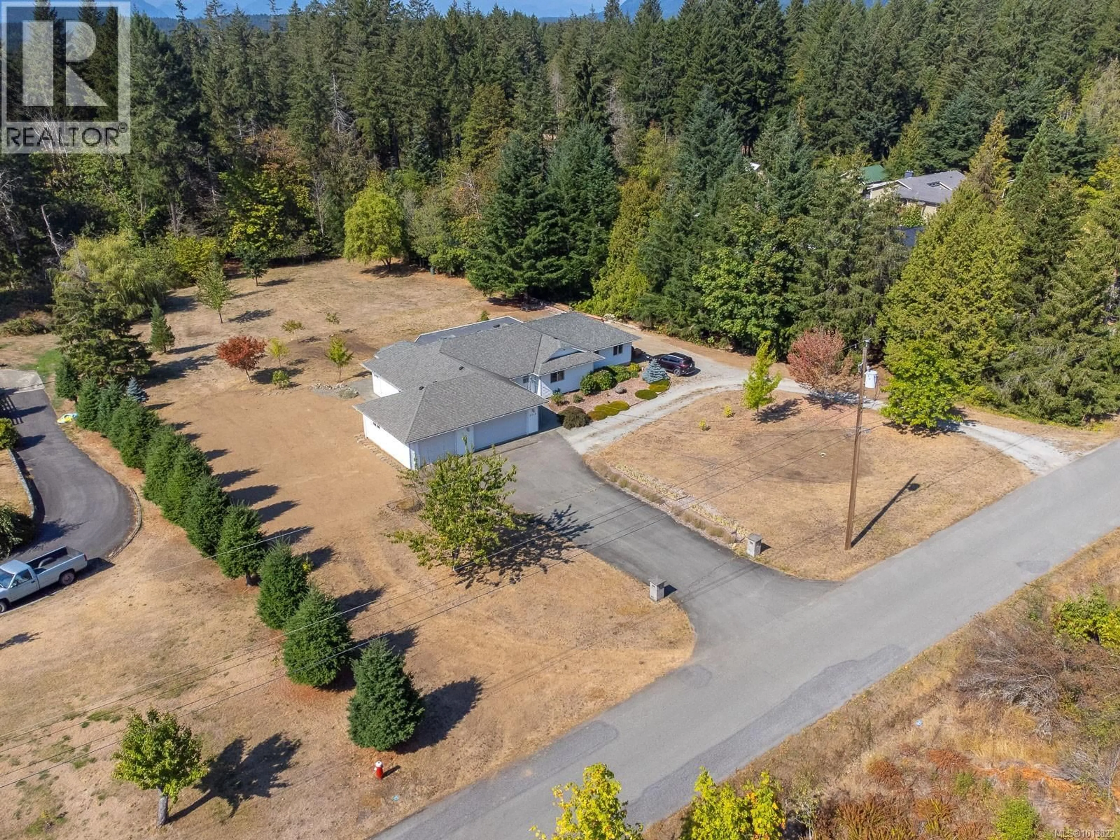 A pic from outside/outdoor area/front of a property/back of a property/a pic from drone, forest/trees view for 5510 DUNDALK AVENUE NORTH, Port Alberni British Columbia V9Y8P8