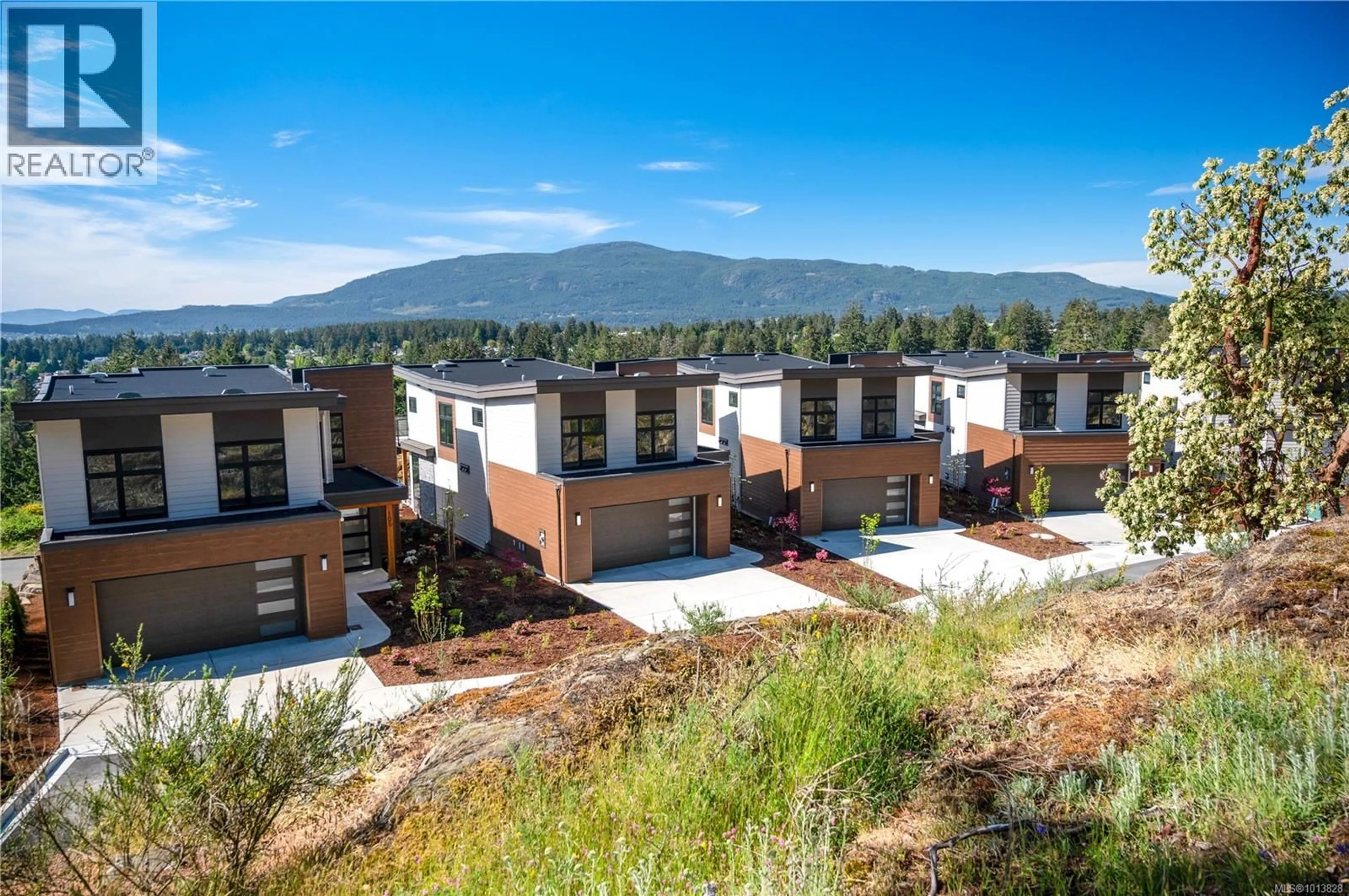 A pic from outside/outdoor area/front of a property/back of a property/a pic from drone, mountain view for 102 - 1220 MANZANITA PLACE, Nanaimo British Columbia V9T0L7
