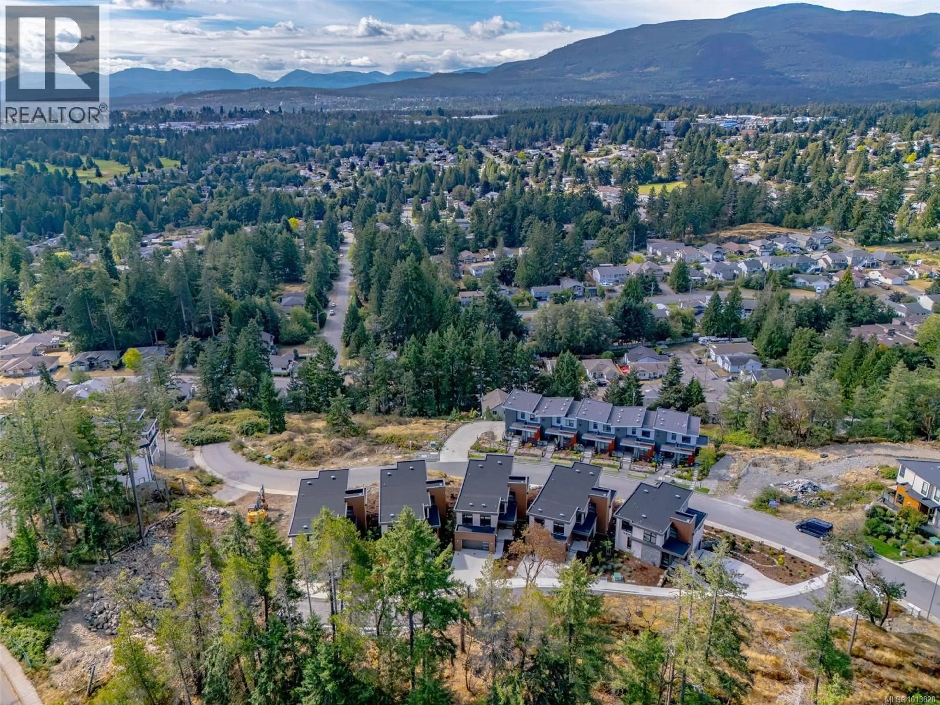 A pic from outside/outdoor area/front of a property/back of a property/a pic from drone, mountain view for 102 - 1220 MANZANITA PLACE, Nanaimo British Columbia V9T0L7