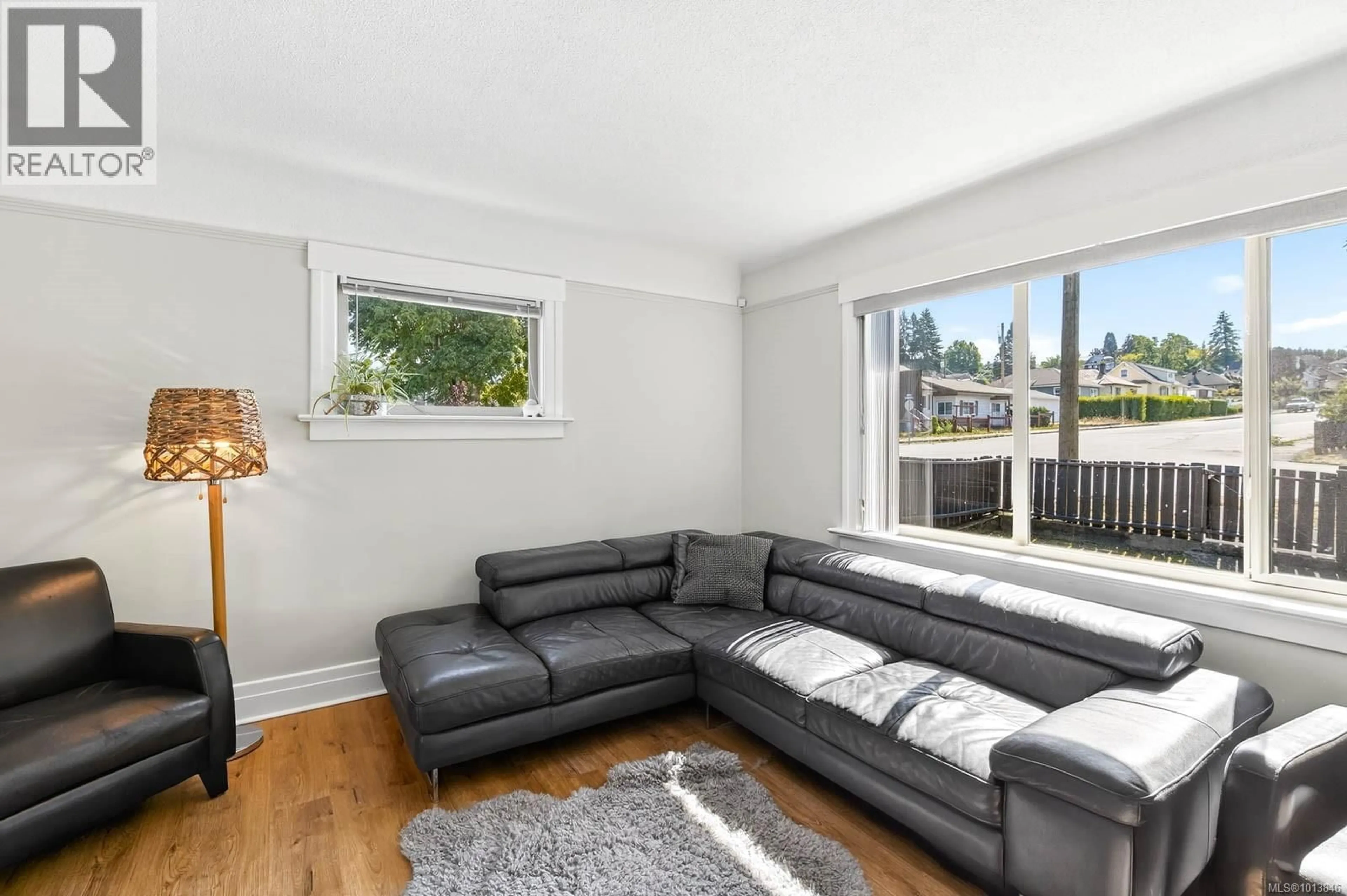 Living room with furniture, wood/laminate floor for 4703 STRATHERN STREET, Port Alberni British Columbia V9Y3E8