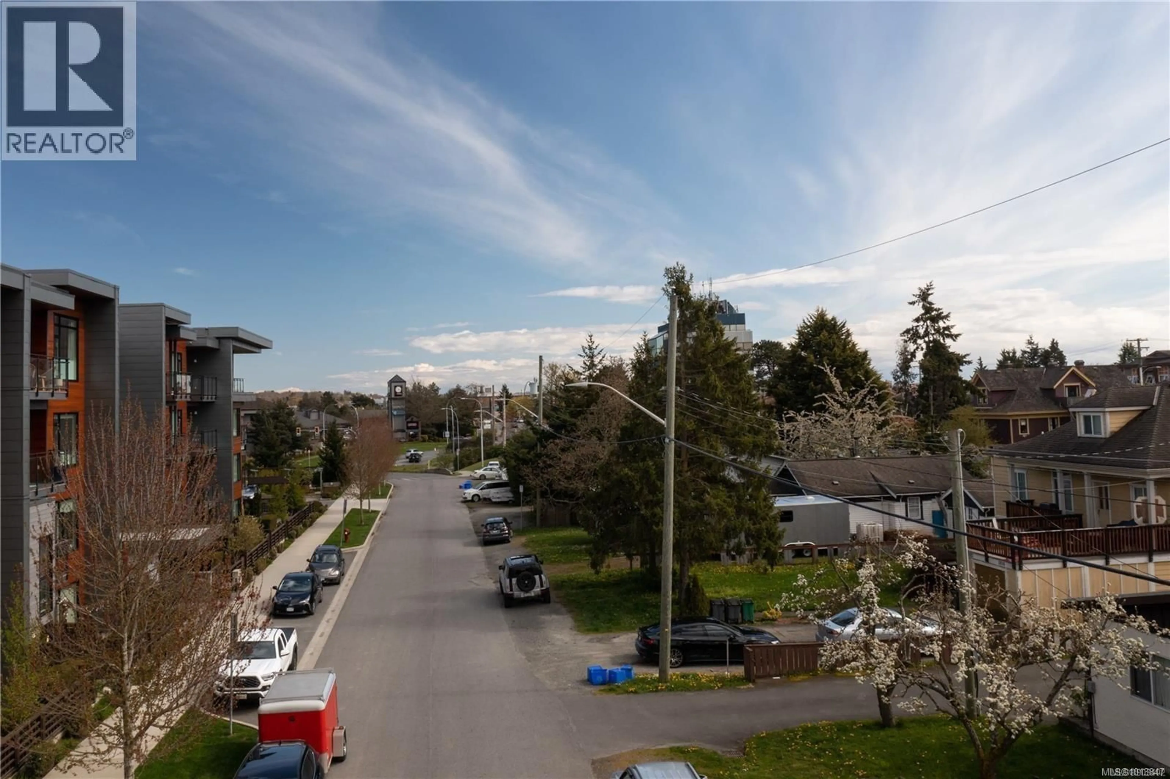 A pic from outside/outdoor area/front of a property/back of a property/a pic from drone, street for 3814 ROWLAND AVENUE, Saanich British Columbia V8Z4C5