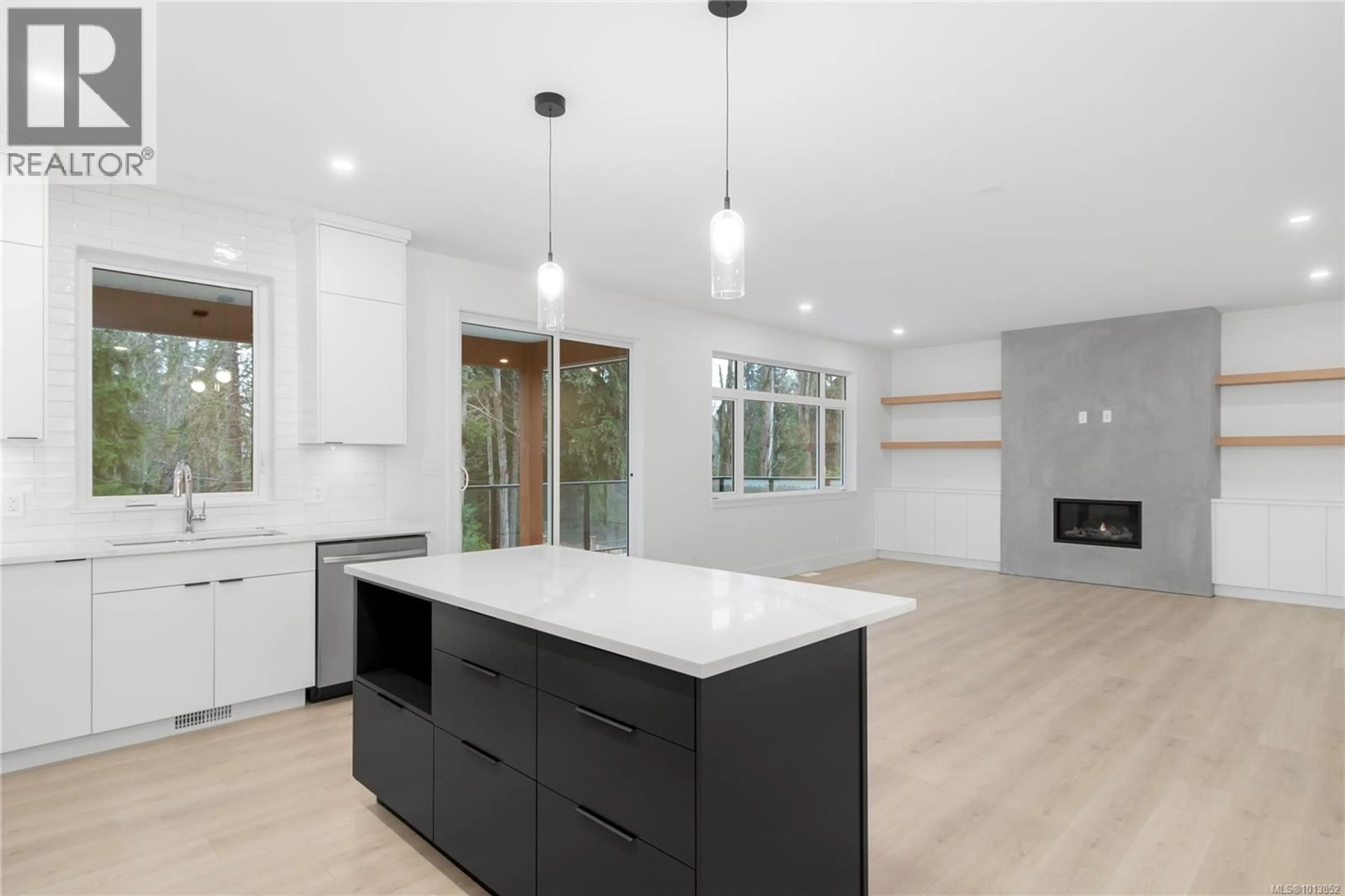 Open concept kitchen, wood/laminate floor for 21 - 1580 GLEN EAGLE DRIVE, Campbell River British Columbia V9W0B3