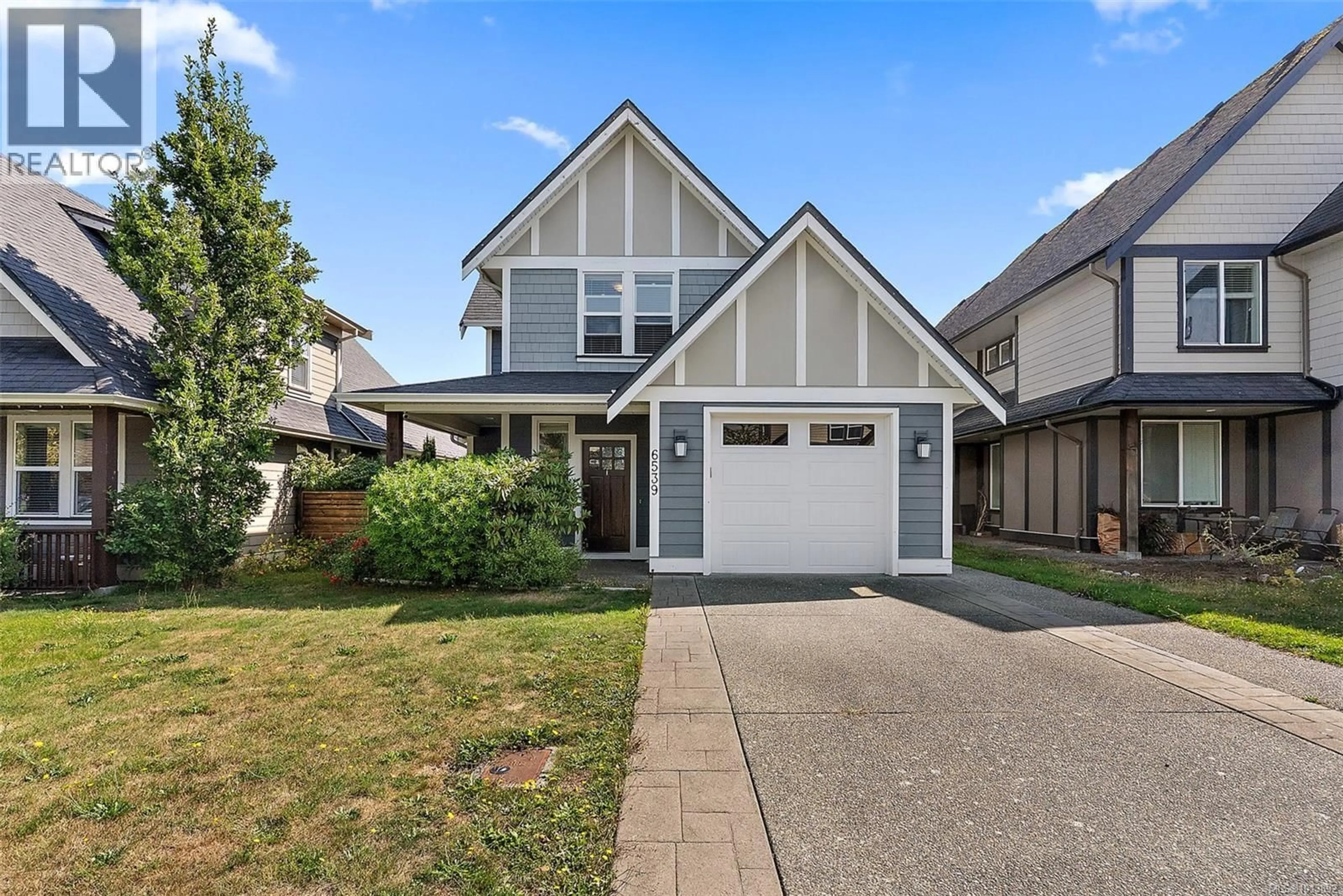 Home with vinyl exterior material, street for 6539 CALLUMWOOD LANE, Sooke British Columbia V9Z0W3