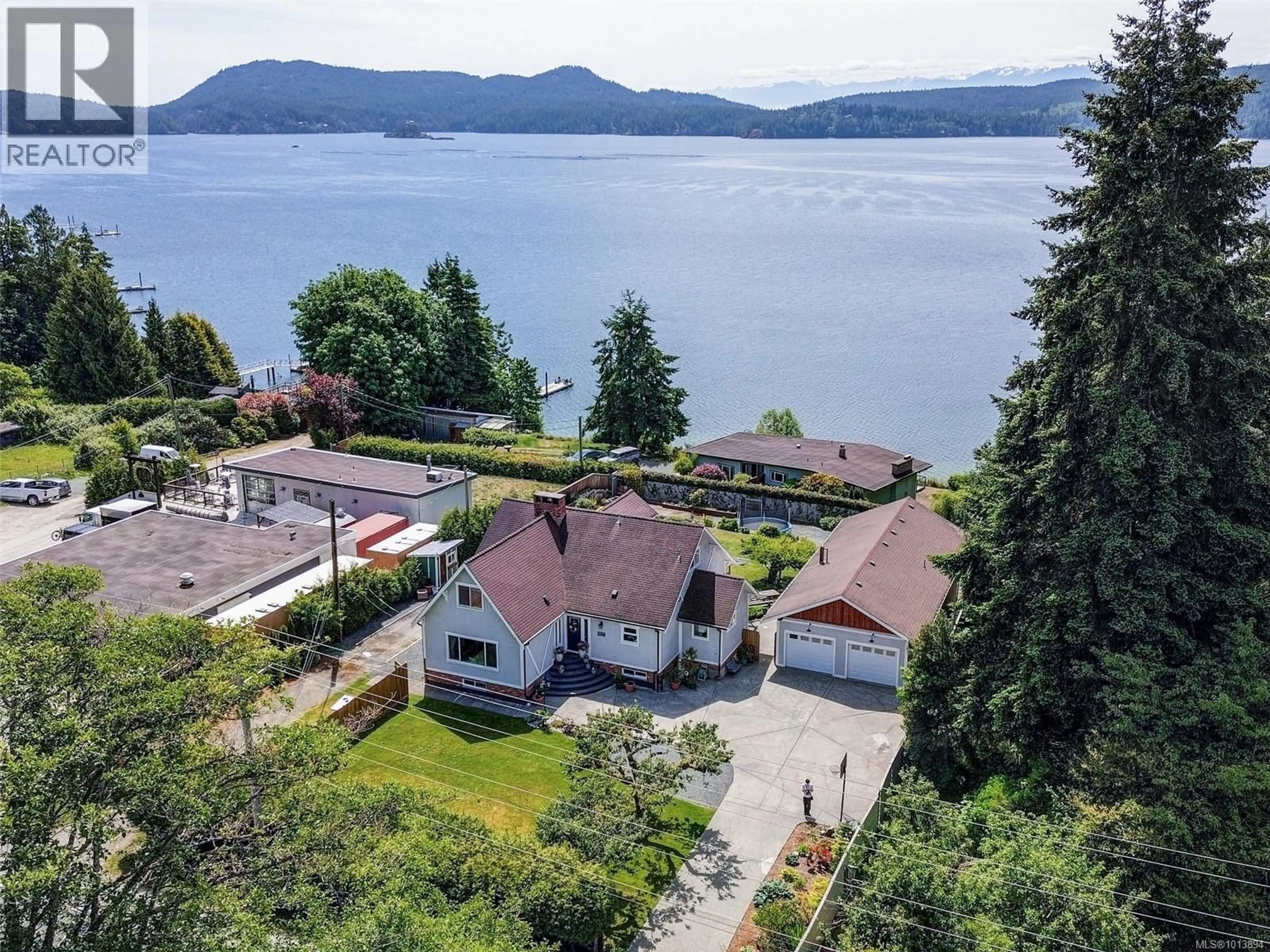 A pic from outside/outdoor area/front of a property/back of a property/a pic from drone, water/lake/river/ocean view for 5877 SOOKE ROAD, Sooke British Columbia V9Z0C3