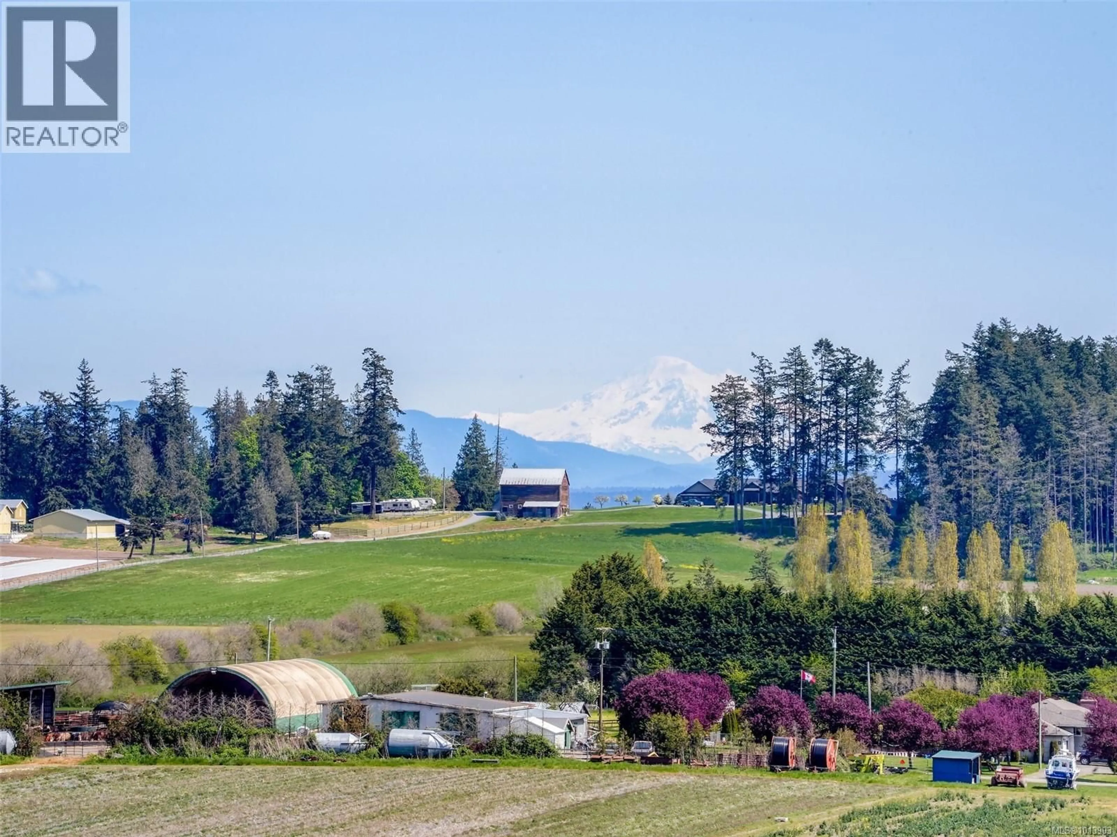 A pic from outside/outdoor area/front of a property/back of a property/a pic from drone, mountain view for 302 - 6981 EAST SAANICH ROAD, Central Saanich British Columbia V8Z5Z2