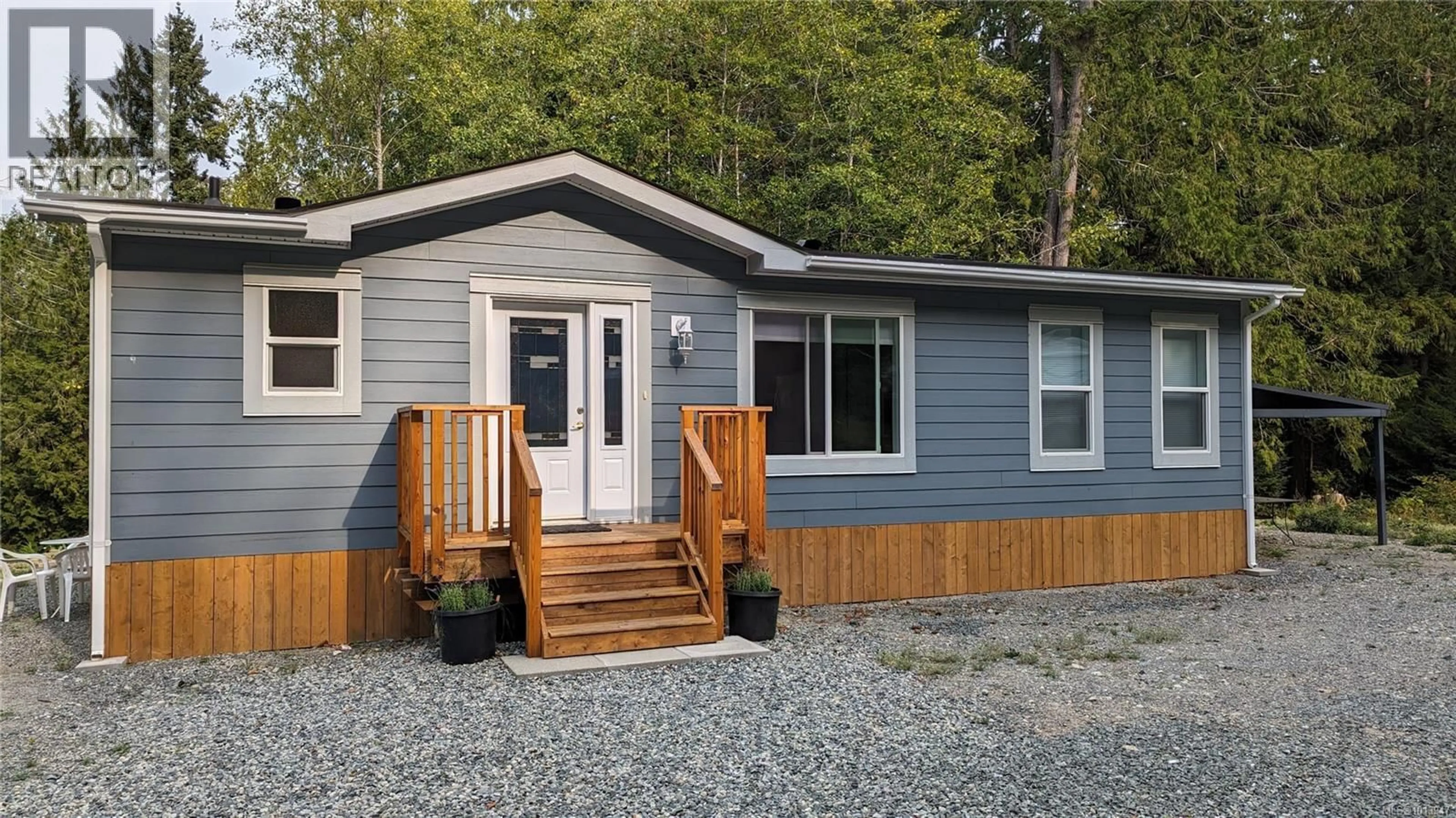 Home with vinyl exterior material, street for 1040 CONVILLE ROAD, Gabriola Island British Columbia V0R1X2