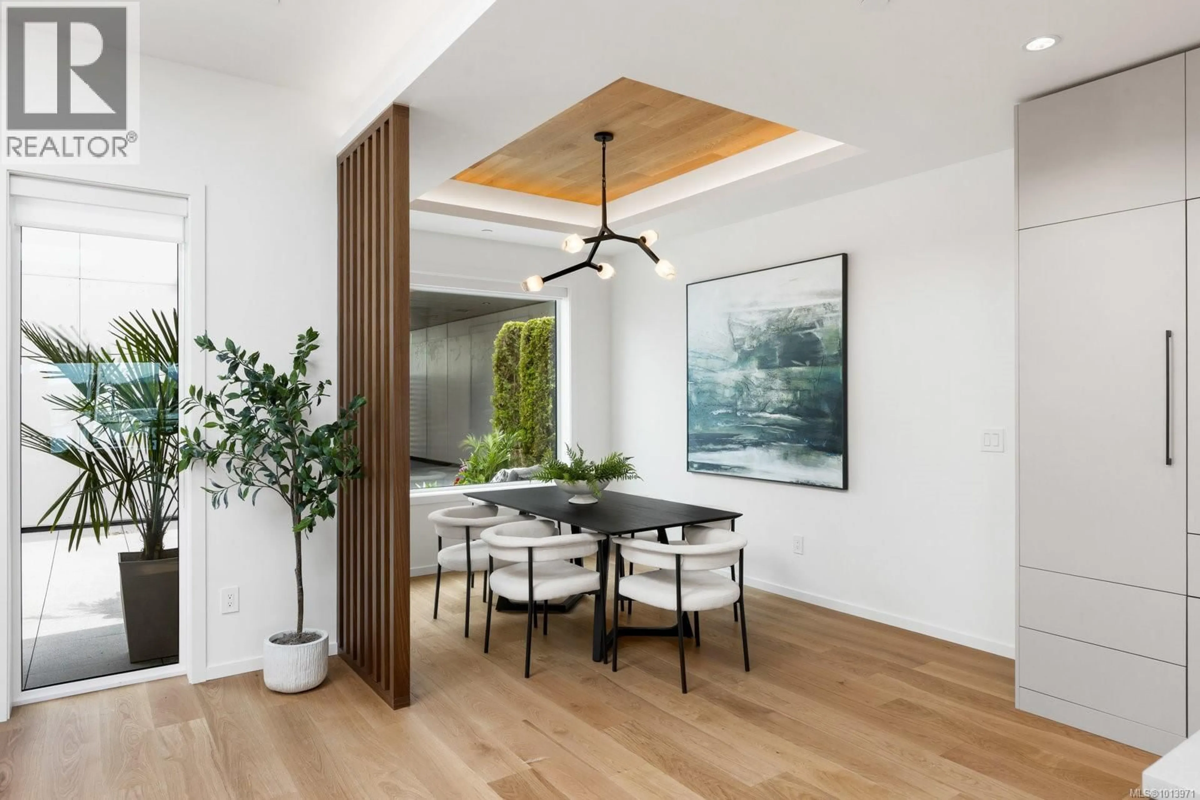 Dining room, wood/laminate floor for 201 - 2270 HARBOUR ROAD, Sidney British Columbia V8L2P6
