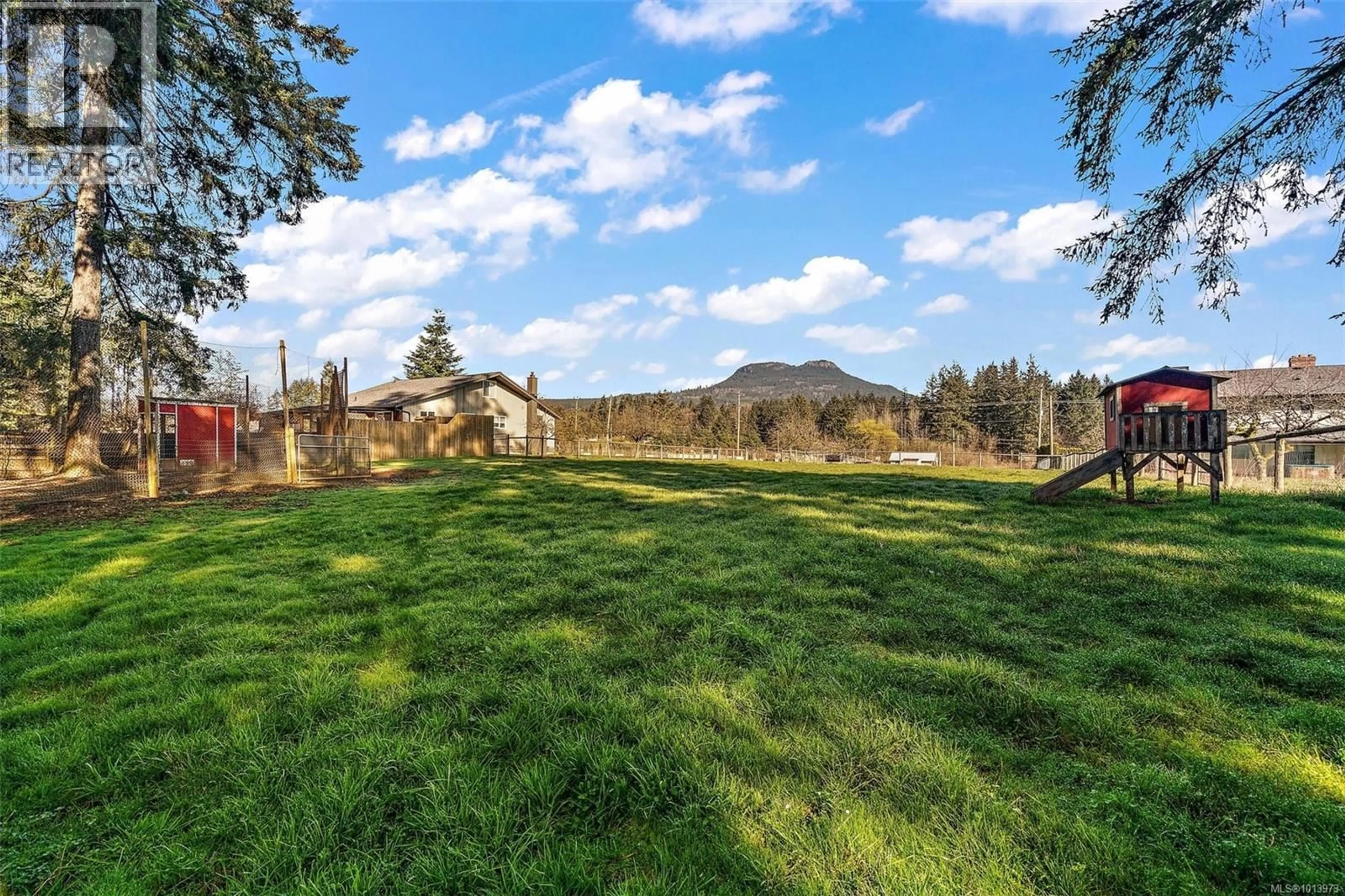 A pic from outside/outdoor area/front of a property/back of a property/a pic from drone, mountain view for 3574 COWICHAN LAKE ROAD, Duncan British Columbia V9L6K5