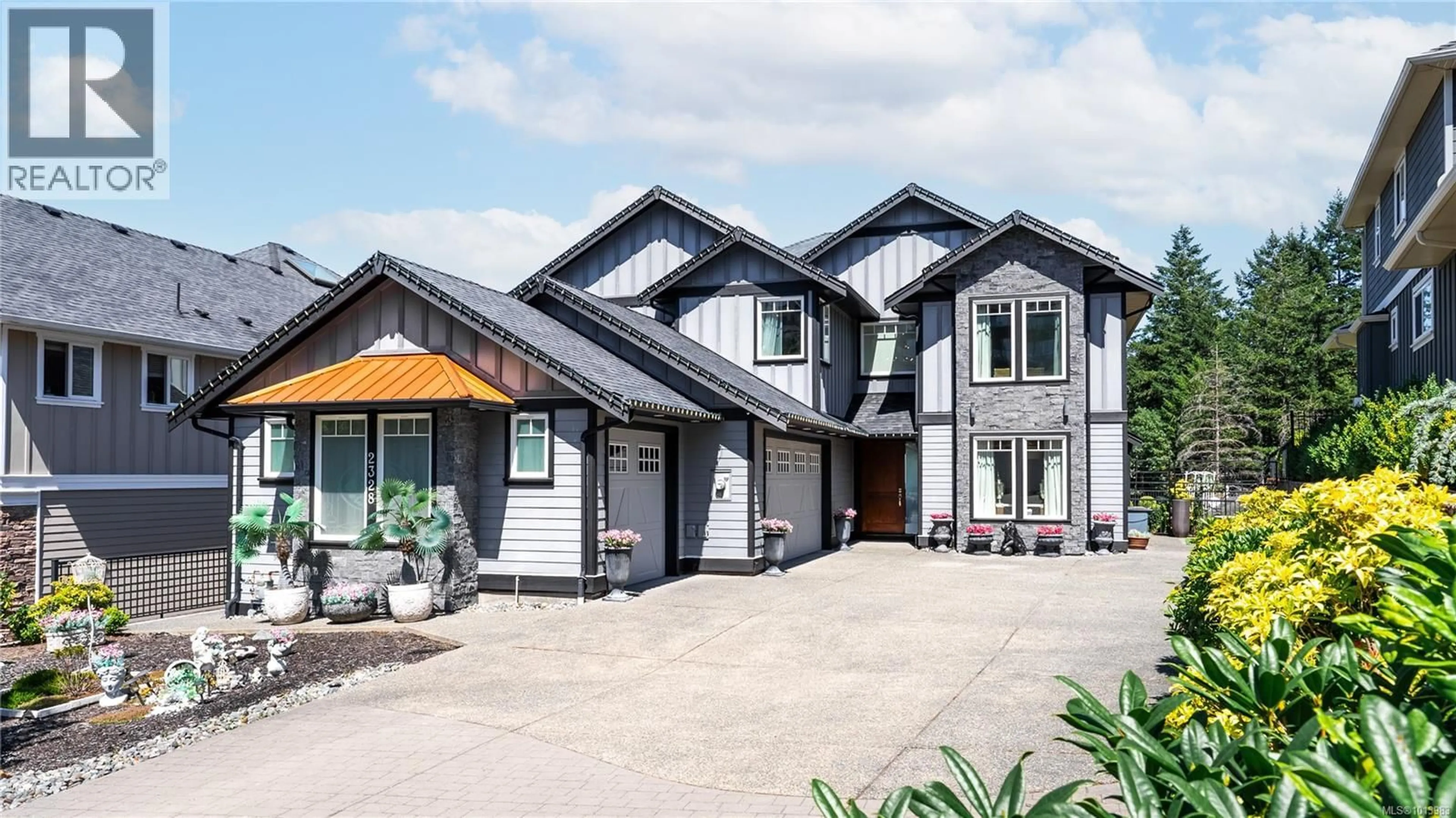 Home with vinyl exterior material, street for 2328 NICKLAUS DRIVE, Langford British Columbia V9B0L2