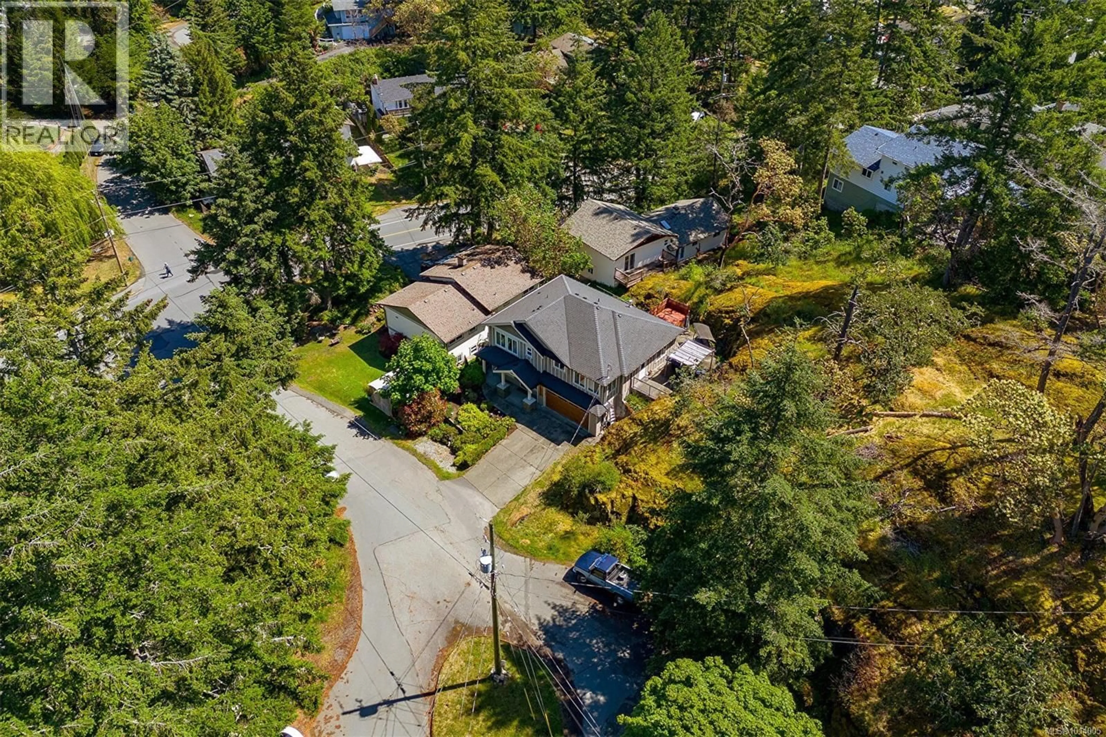 A pic from outside/outdoor area/front of a property/back of a property/a pic from drone, street for 101 DORVAL PLACE, Langford British Columbia V9B5A7