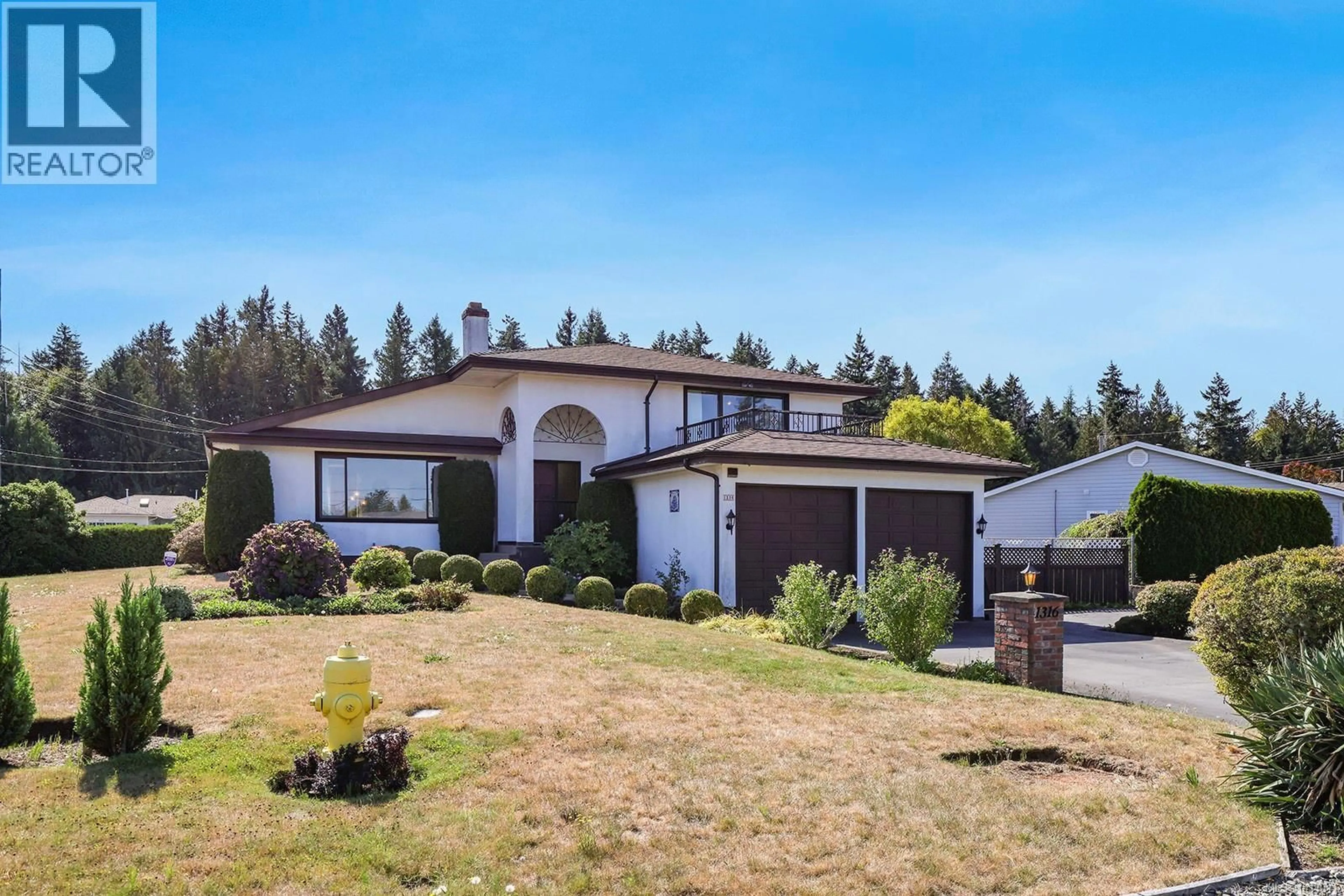 A pic from outside/outdoor area/front of a property/back of a property/a pic from drone, mountain view for 1316 GILLEY CRESCENT, Parksville British Columbia V9P1W9