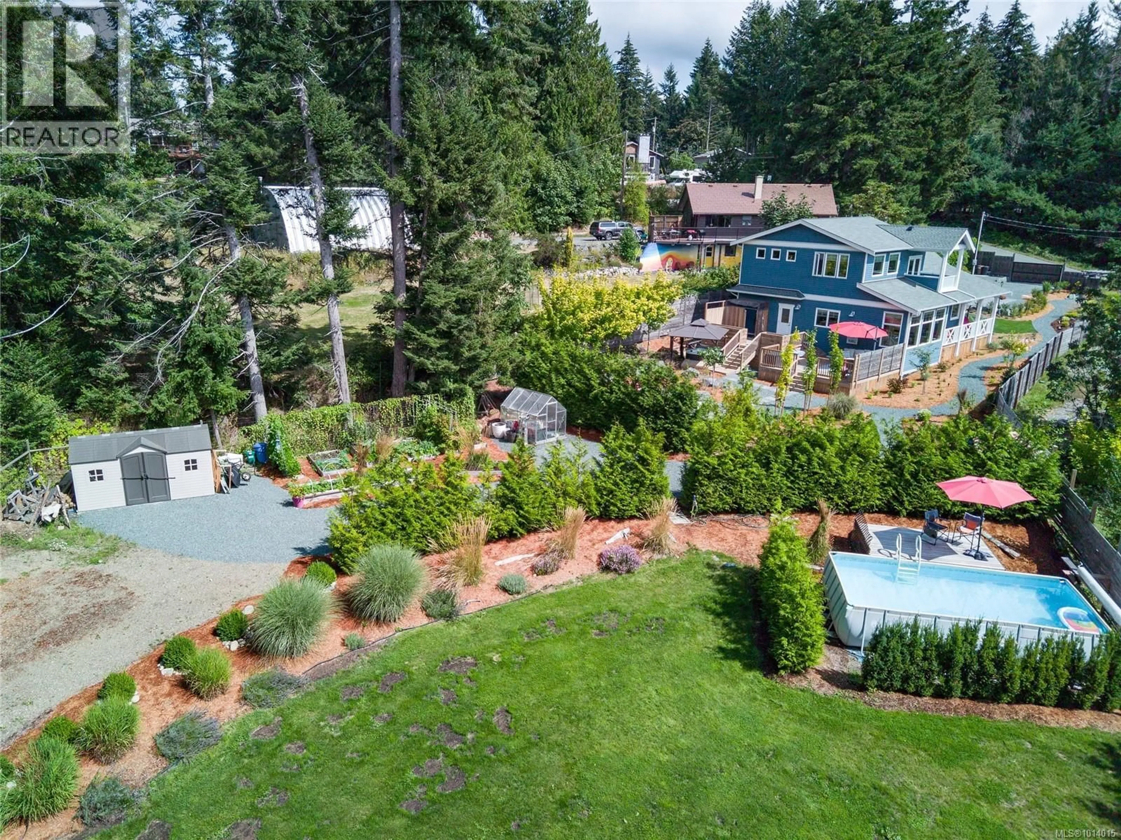 A pic from outside/outdoor area/front of a property/back of a property/a pic from drone, mountain view for 7863 TOZER ROAD, Fanny Bay British Columbia V0R1W0