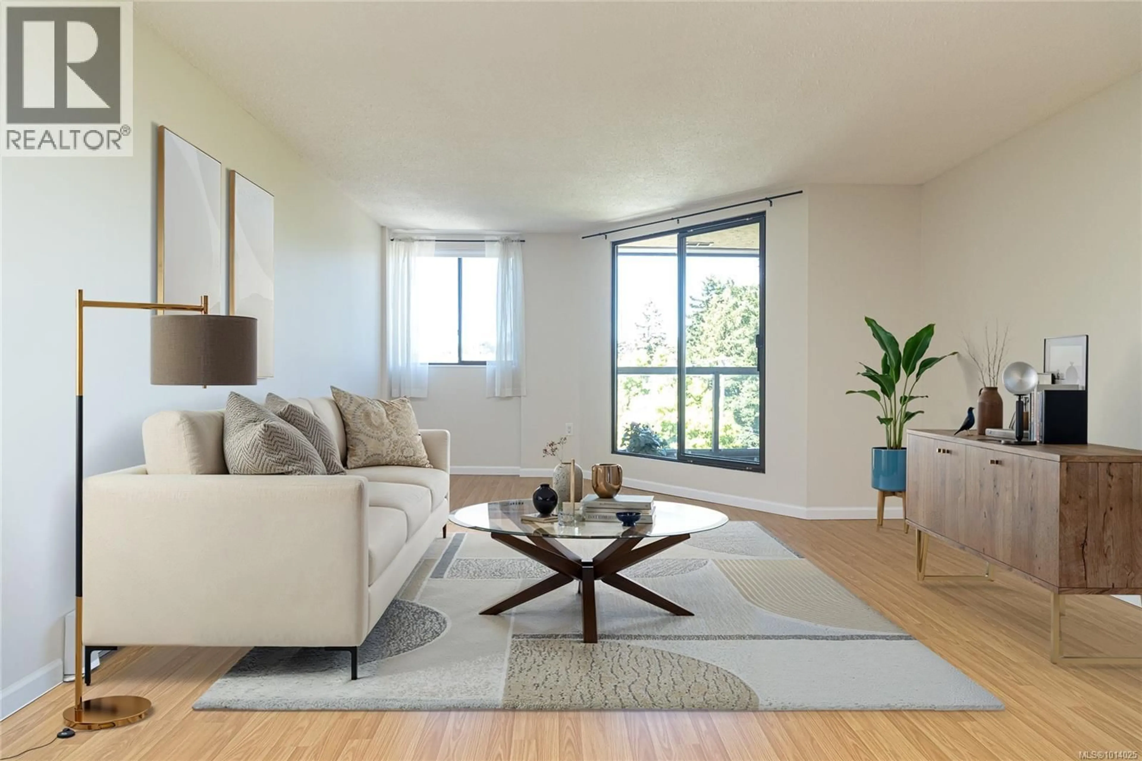 Living room with furniture, wood/laminate floor for 511 - 1745 LEIGHTON ROAD, Victoria British Columbia V8R6R6