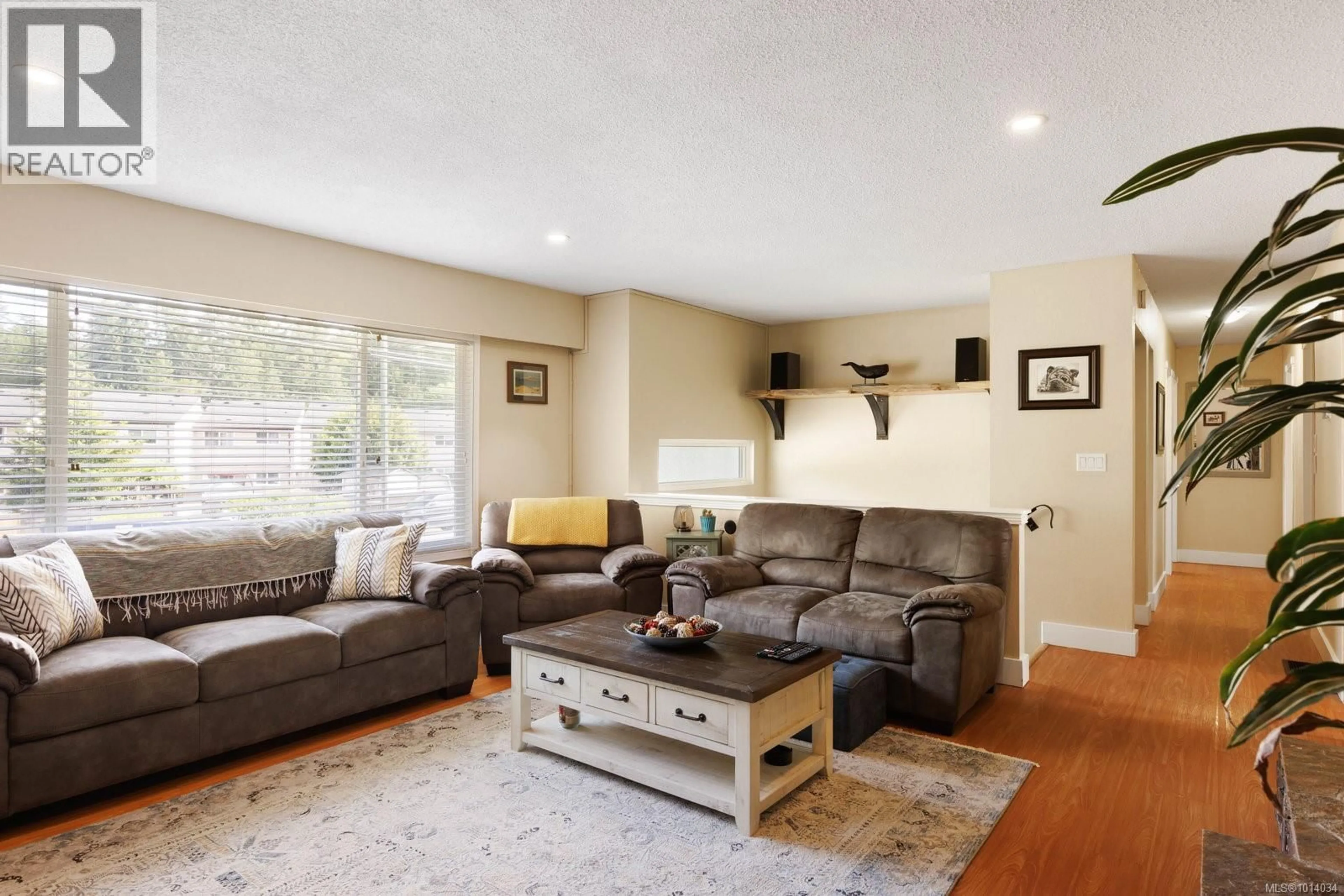Living room with furniture, wood/laminate floor for 2867 SOOKE LAKE ROAD, Langford British Columbia V9B4R1