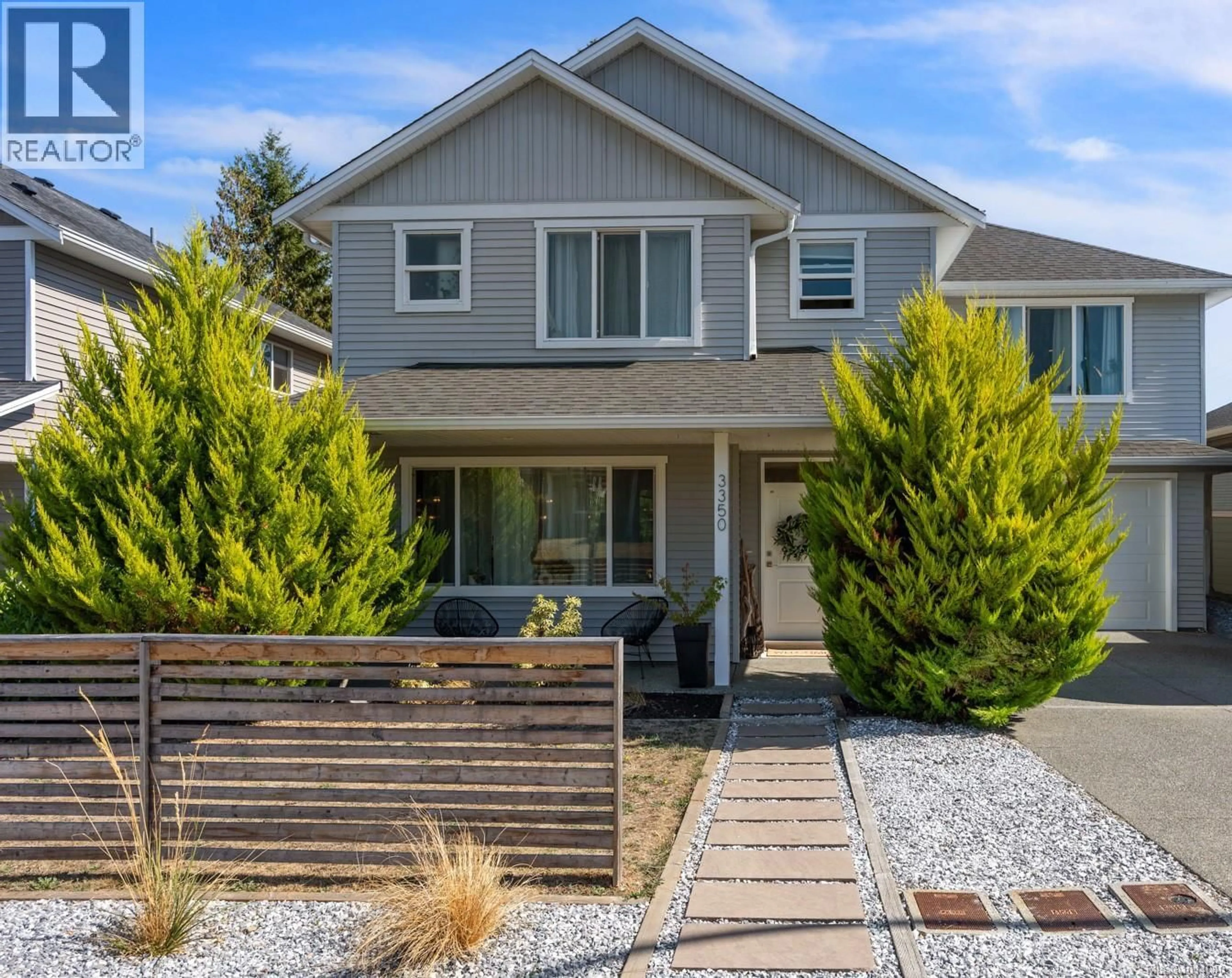 Home with vinyl exterior material, street for 3350 SOLPORT STREET, Cumberland British Columbia V0R1S0