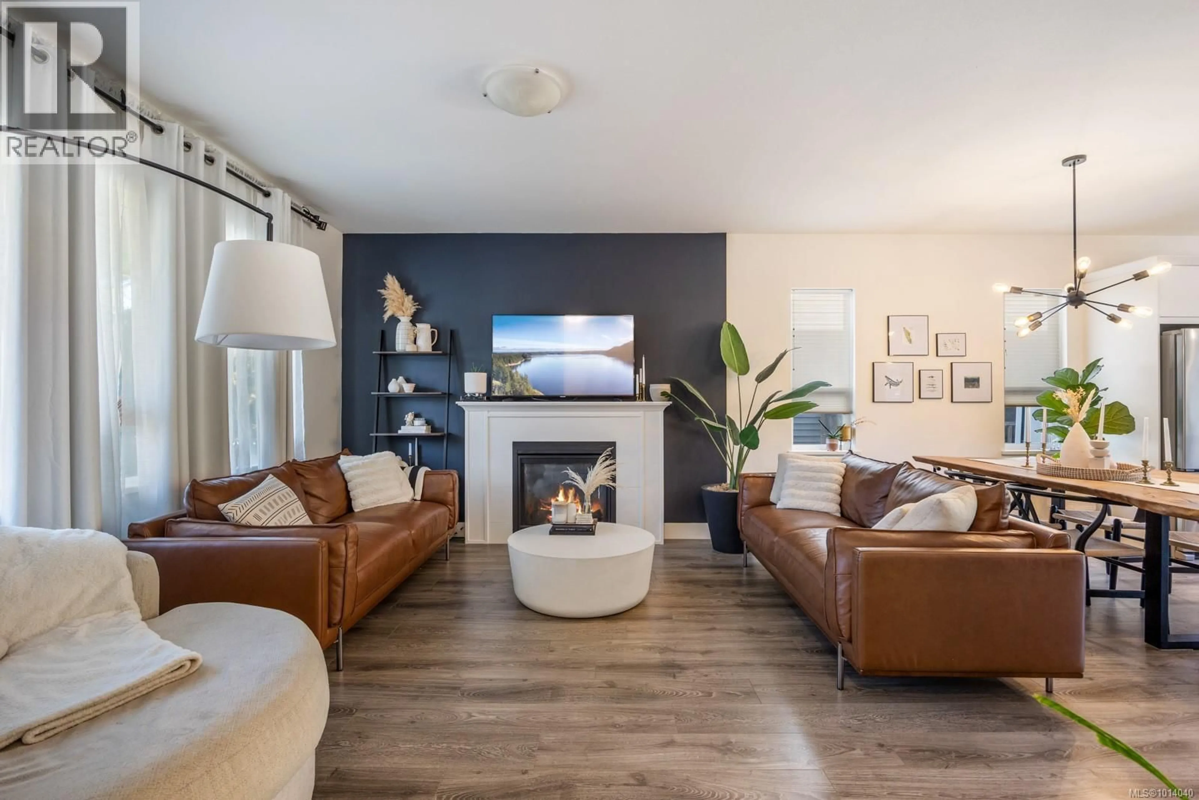 Living room with furniture, unknown for 3350 SOLPORT STREET, Cumberland British Columbia V0R1S0