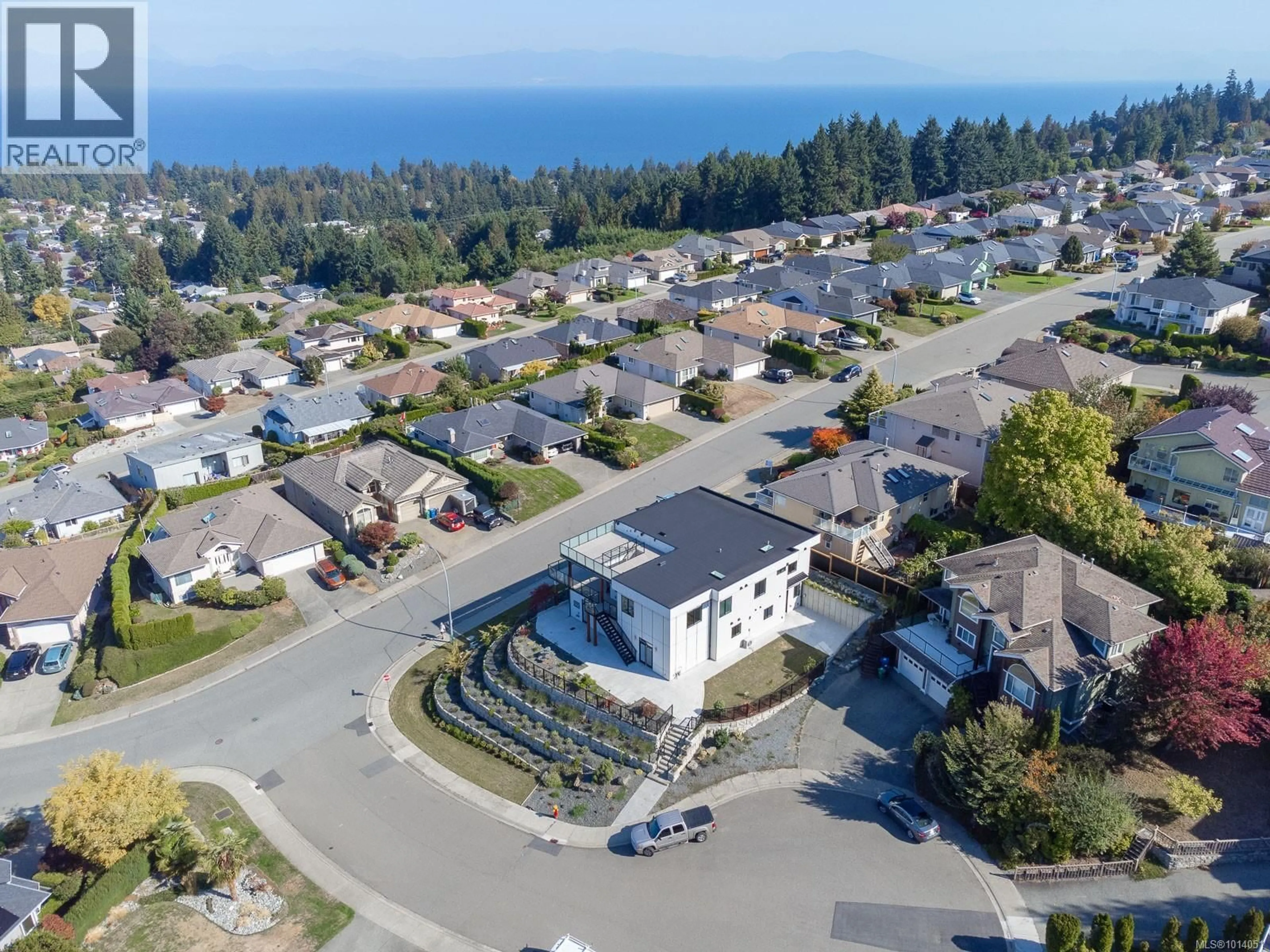 A pic from outside/outdoor area/front of a property/back of a property/a pic from drone, water/lake/river/ocean view for 5391 KENWILL DRIVE, Nanaimo British Columbia V9T5Z9