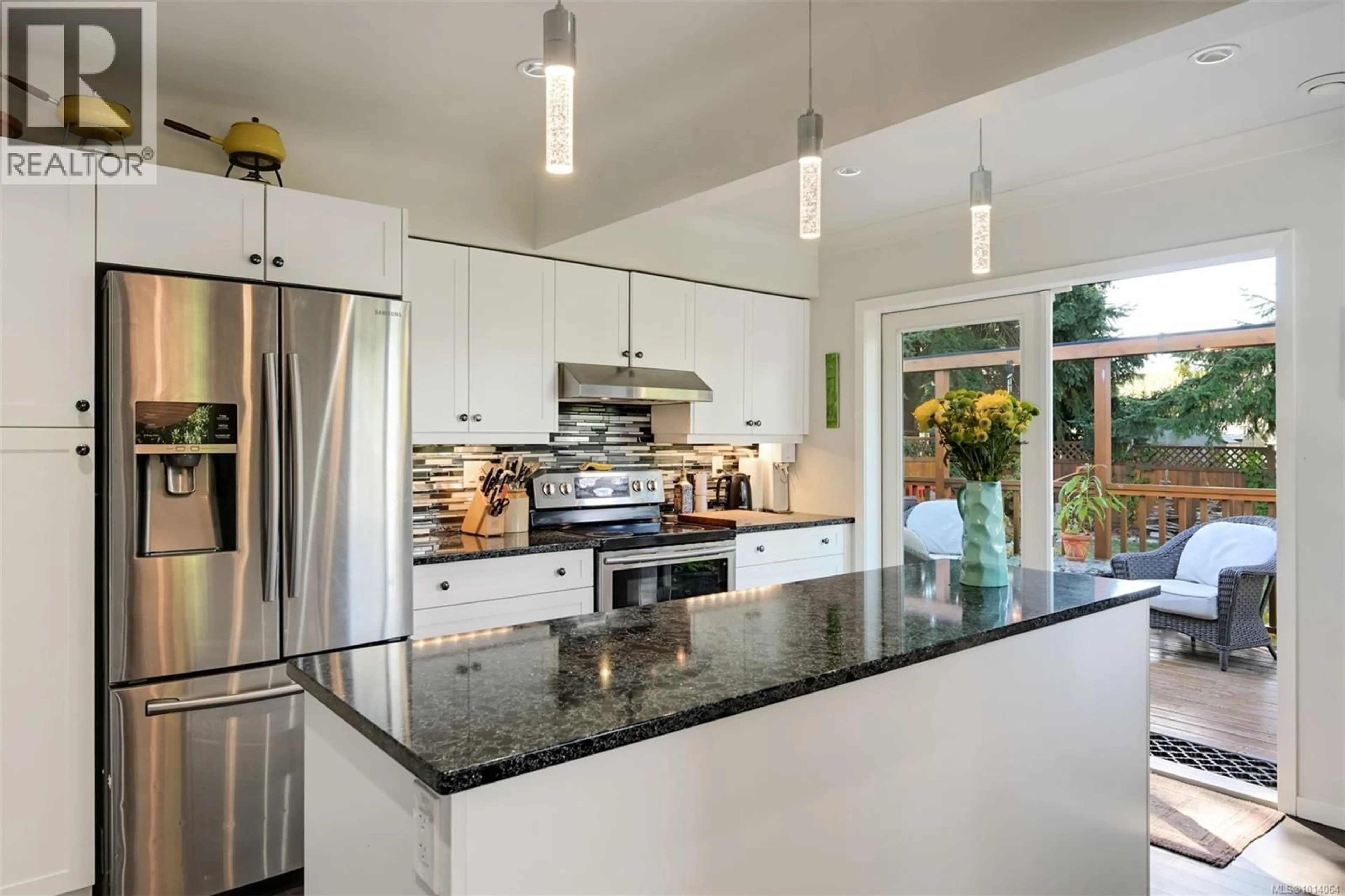 Contemporary kitchen, ceramic/tile floor for 815 LESLIE DRIVE, Saanich British Columbia V8X2Y3