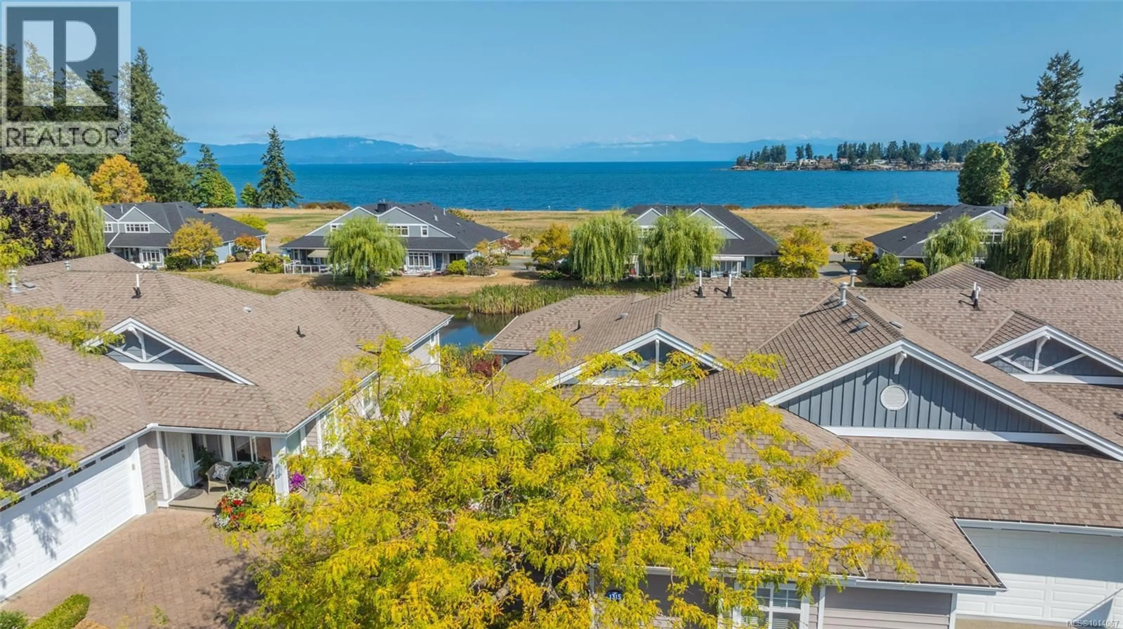 A pic from outside/outdoor area/front of a property/back of a property/a pic from drone, water/lake/river/ocean view for 1315 SATURNA DRIVE, Parksville British Columbia V9P2X9