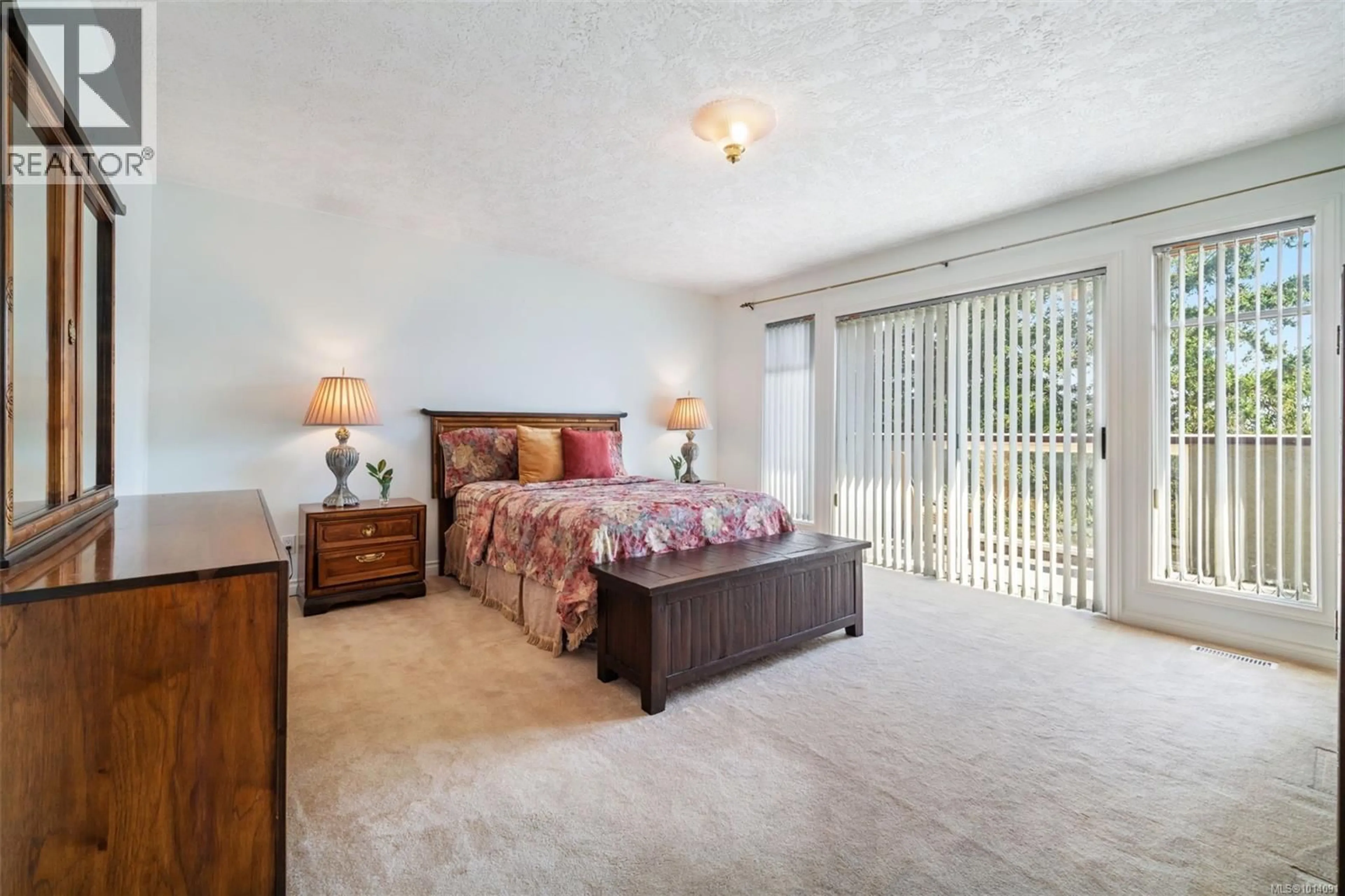 Bedroom with bed, carpet floor for 899 CURRANDALE COURT, Saanich British Columbia V8X4Y2