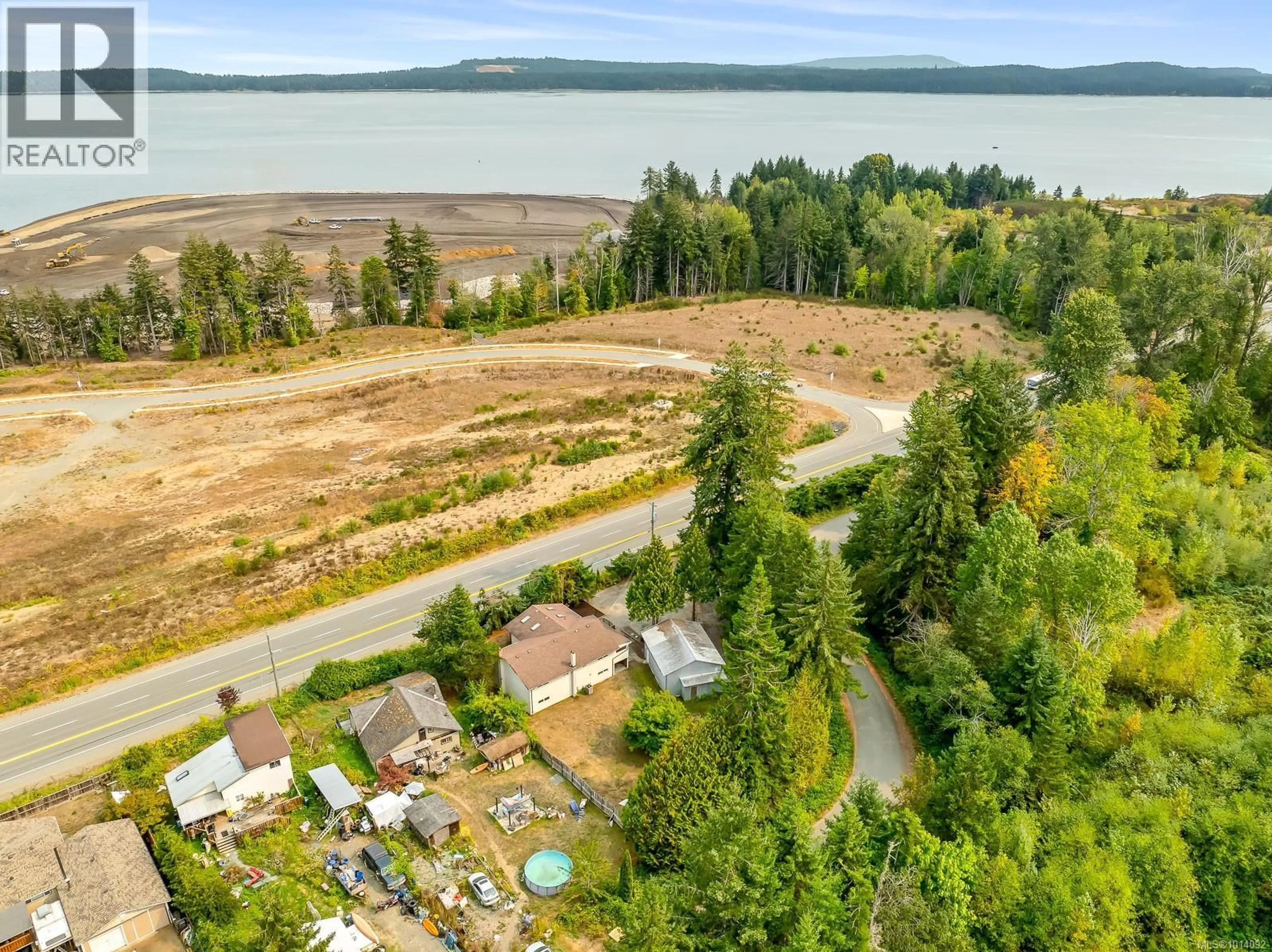 A pic from outside/outdoor area/front of a property/back of a property/a pic from drone, water/lake/river/ocean view for 5303 ISLAND HIGHWAY SOUTH, Union Bay British Columbia V0R3B0