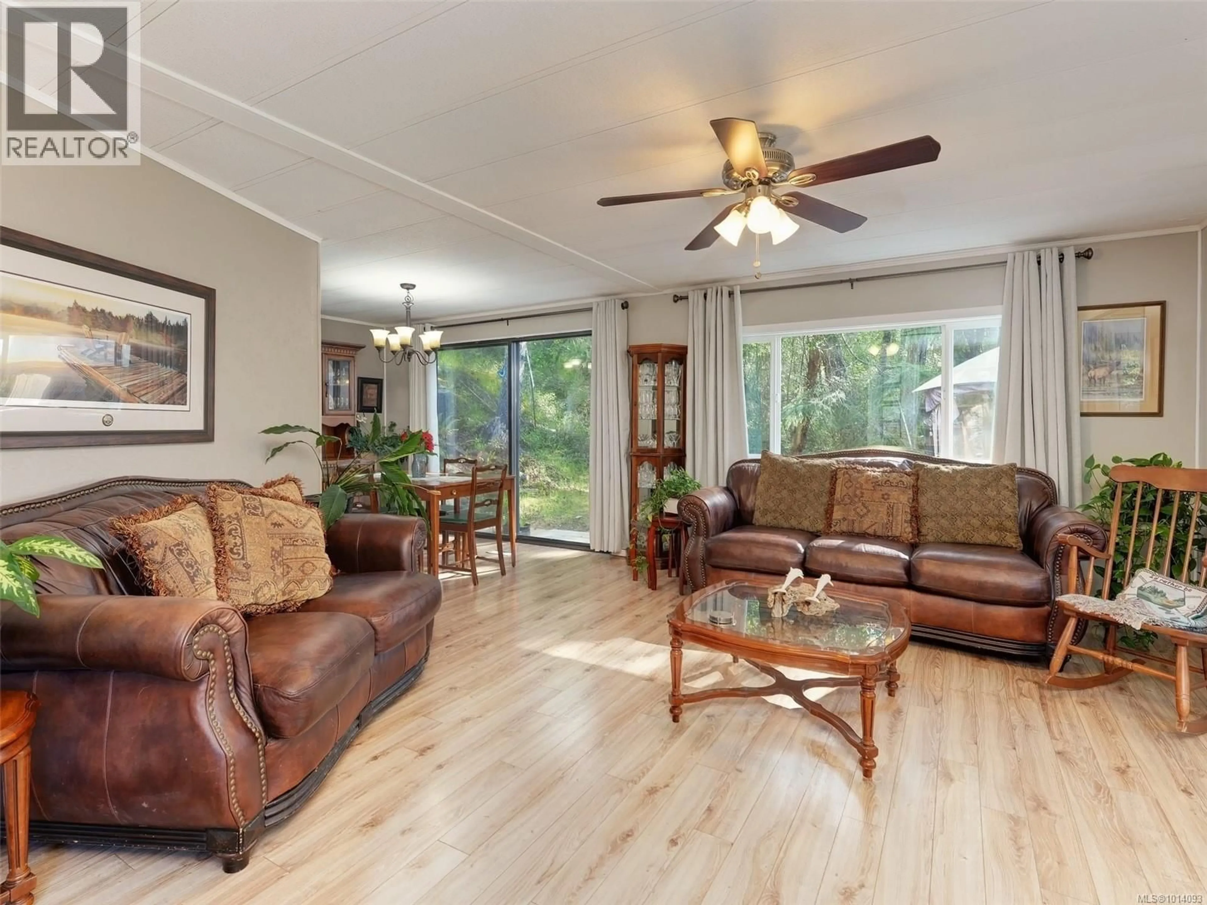 Living room with furniture, wood/laminate floor for 97 - 5838 BLYTHWOOD ROAD, Sooke British Columbia V9Z1G1