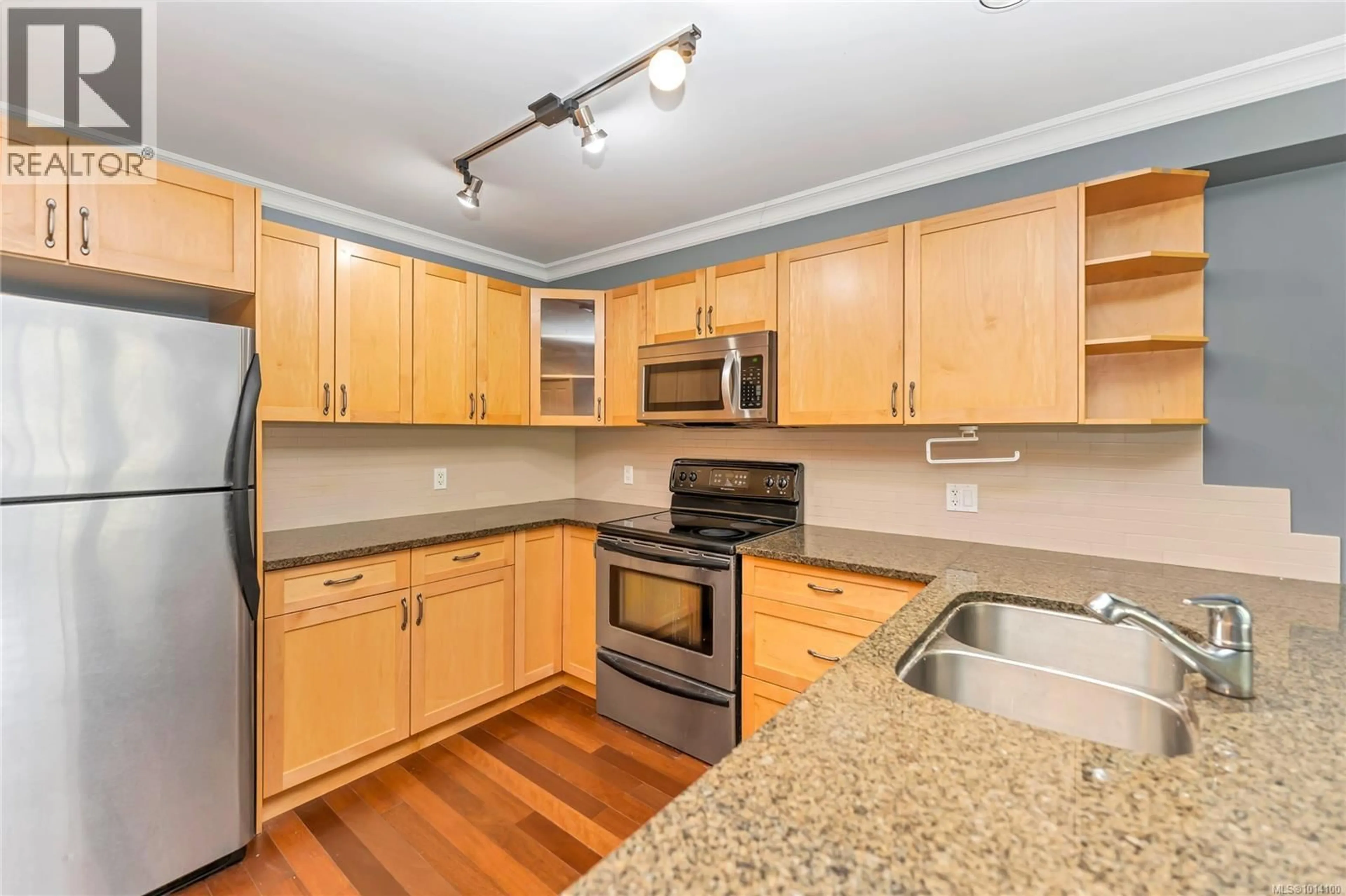 Standard kitchen, wood/laminate floor for 203 - 1514 CHURCH AVENUE, Saanich British Columbia V8P0A3