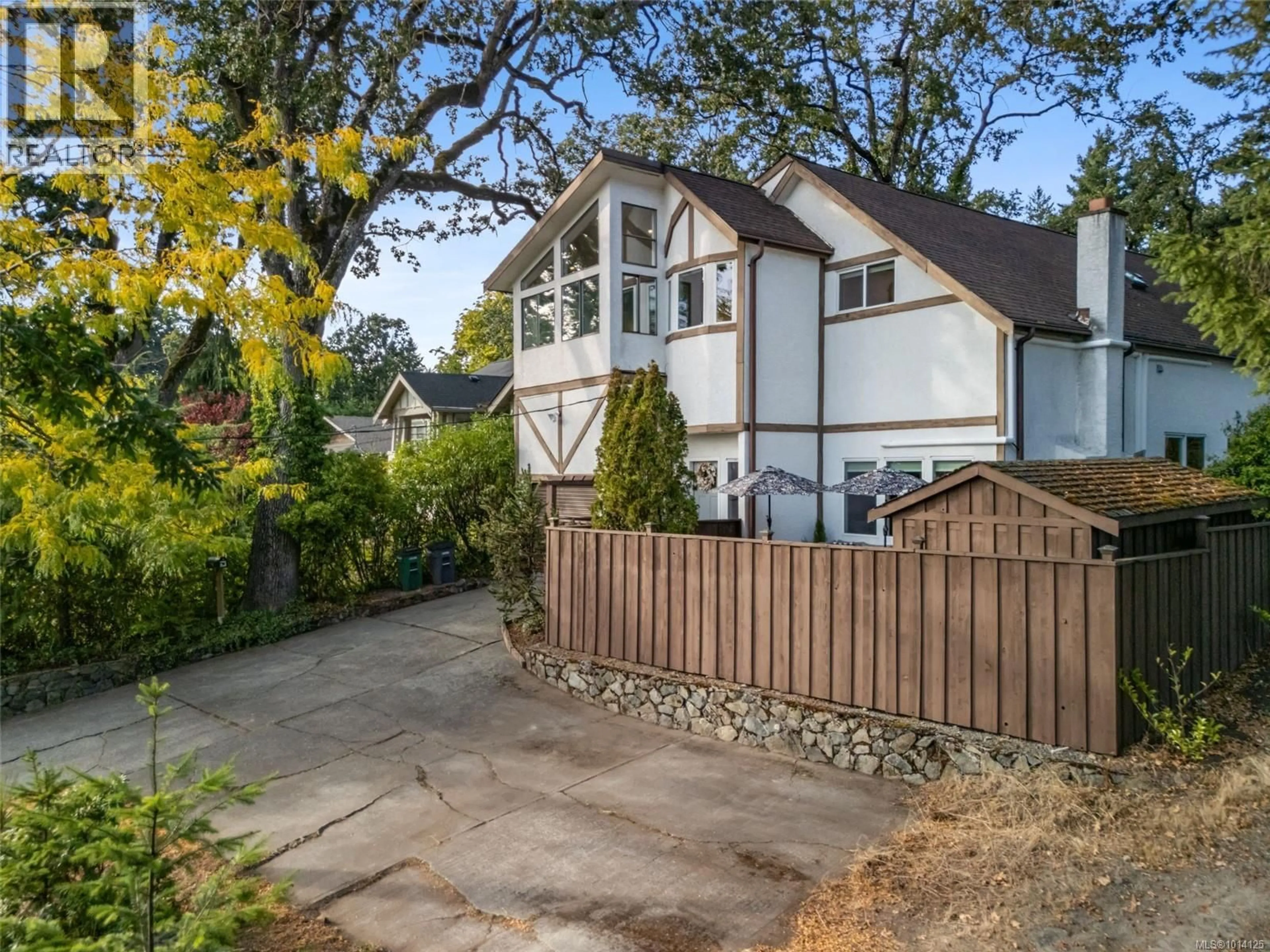 A pic from outside/outdoor area/front of a property/back of a property/a pic from drone, street for 1030 BURNSIDE ROAD WEST, Saanich British Columbia V8Z1N3
