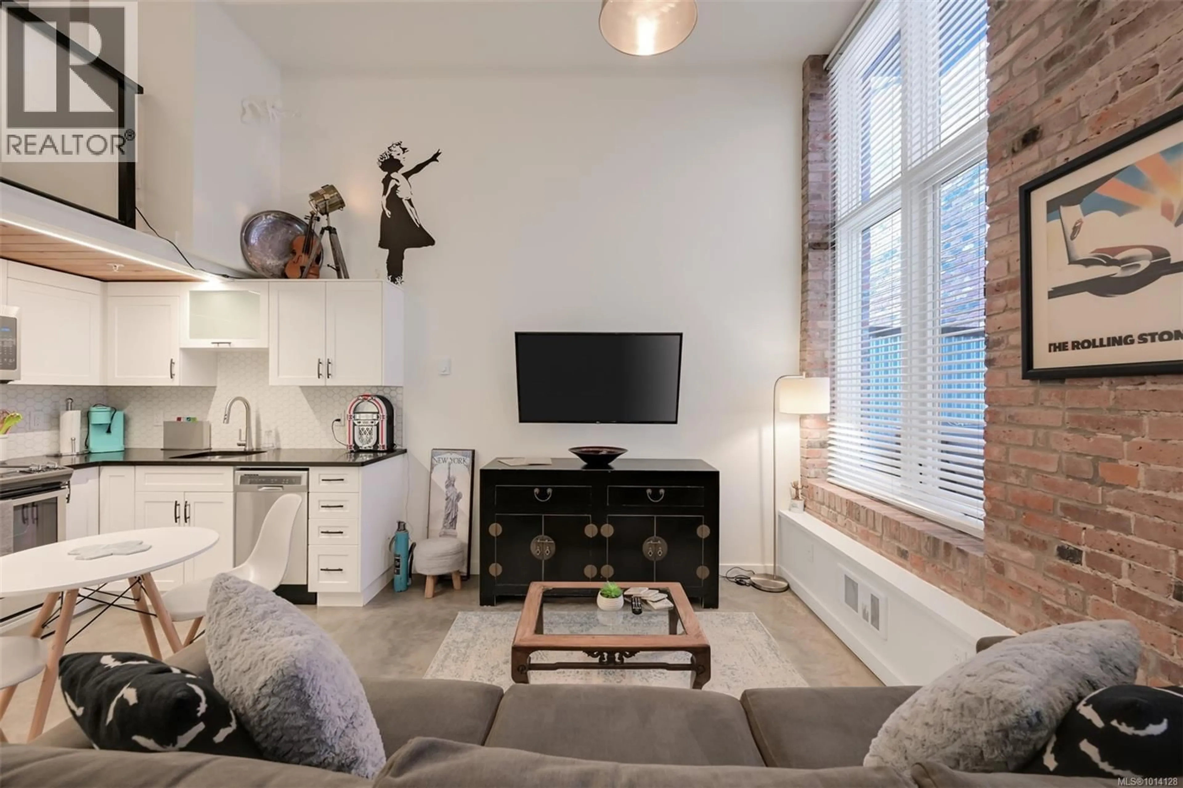 Living room with furniture, unknown for 103 - 534 PANDORA AVENUE, Victoria British Columbia V8W1N6