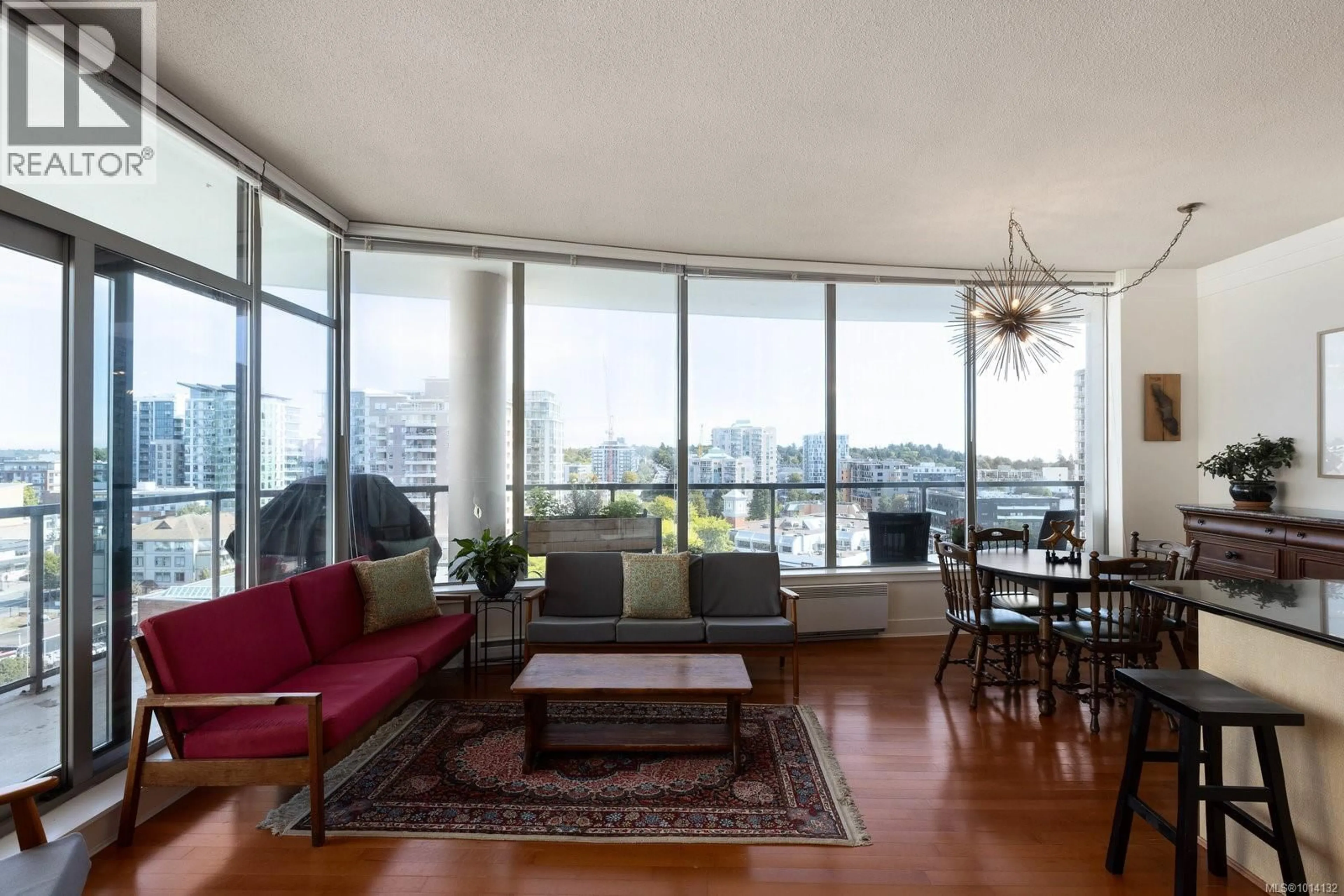 Living room with furniture, wood/laminate floor for 1008 - 845 YATES STREET, Victoria British Columbia V8W4A3