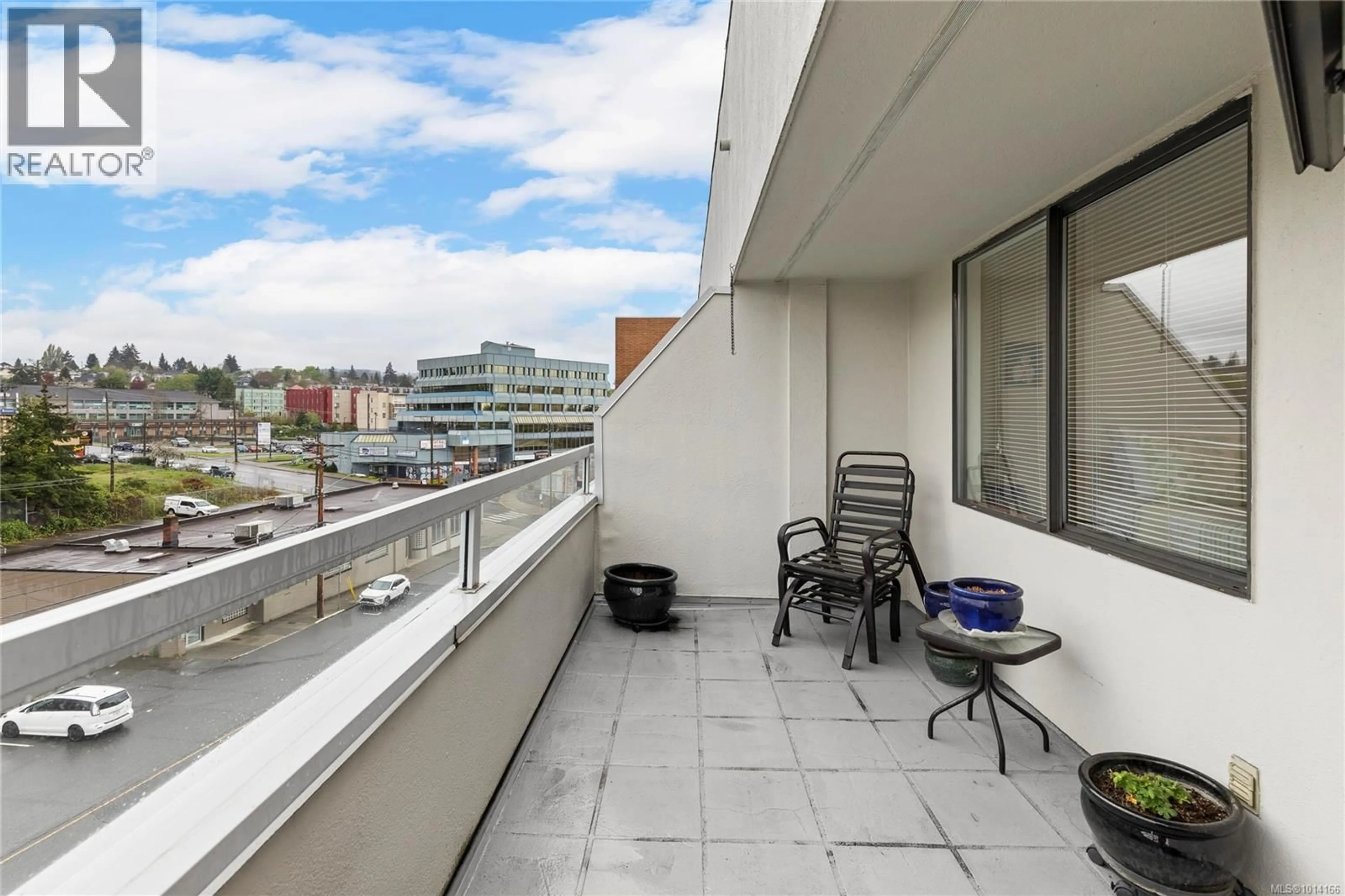 Balcony in the apartment, city buildings view from balcony for 412 - 30 CAVAN STREET, Nanaimo British Columbia V9R6K3