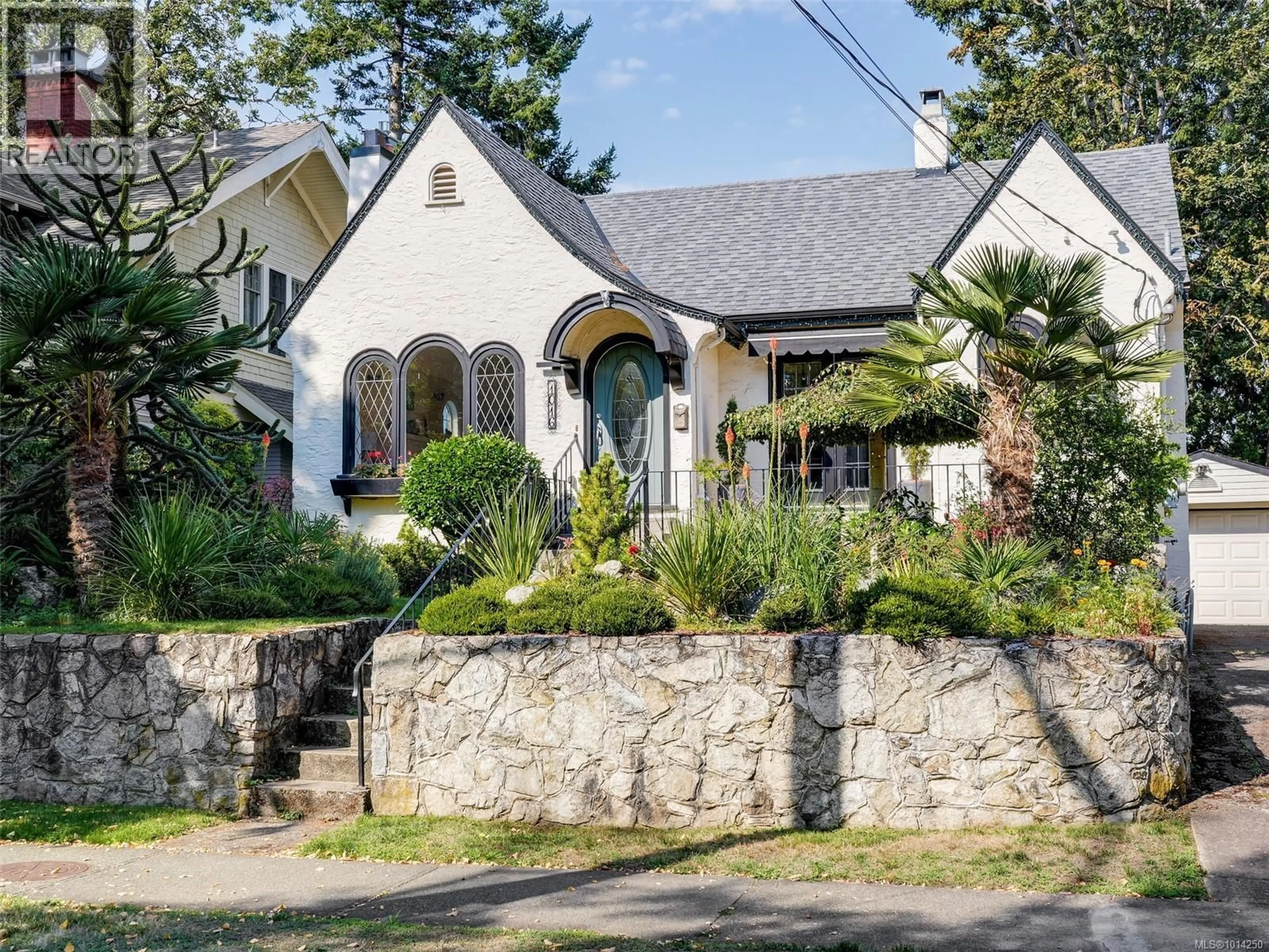 Home with brick exterior material, street for 1016 CRAIGDARROCH ROAD, Victoria British Columbia V8S2A4