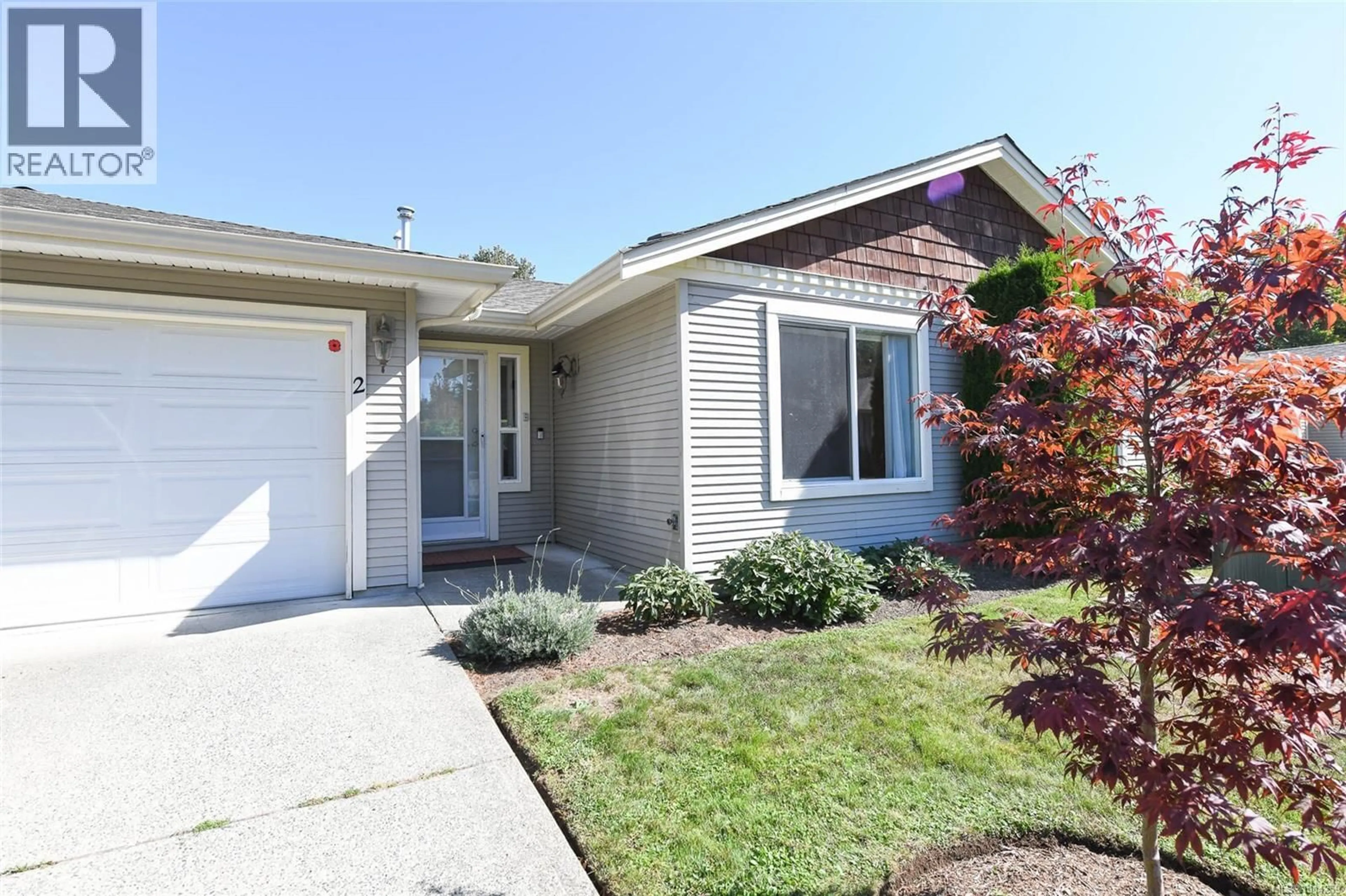 Home with vinyl exterior material, street for 2 - 1050 8TH STREET, Courtenay British Columbia V9N4A5