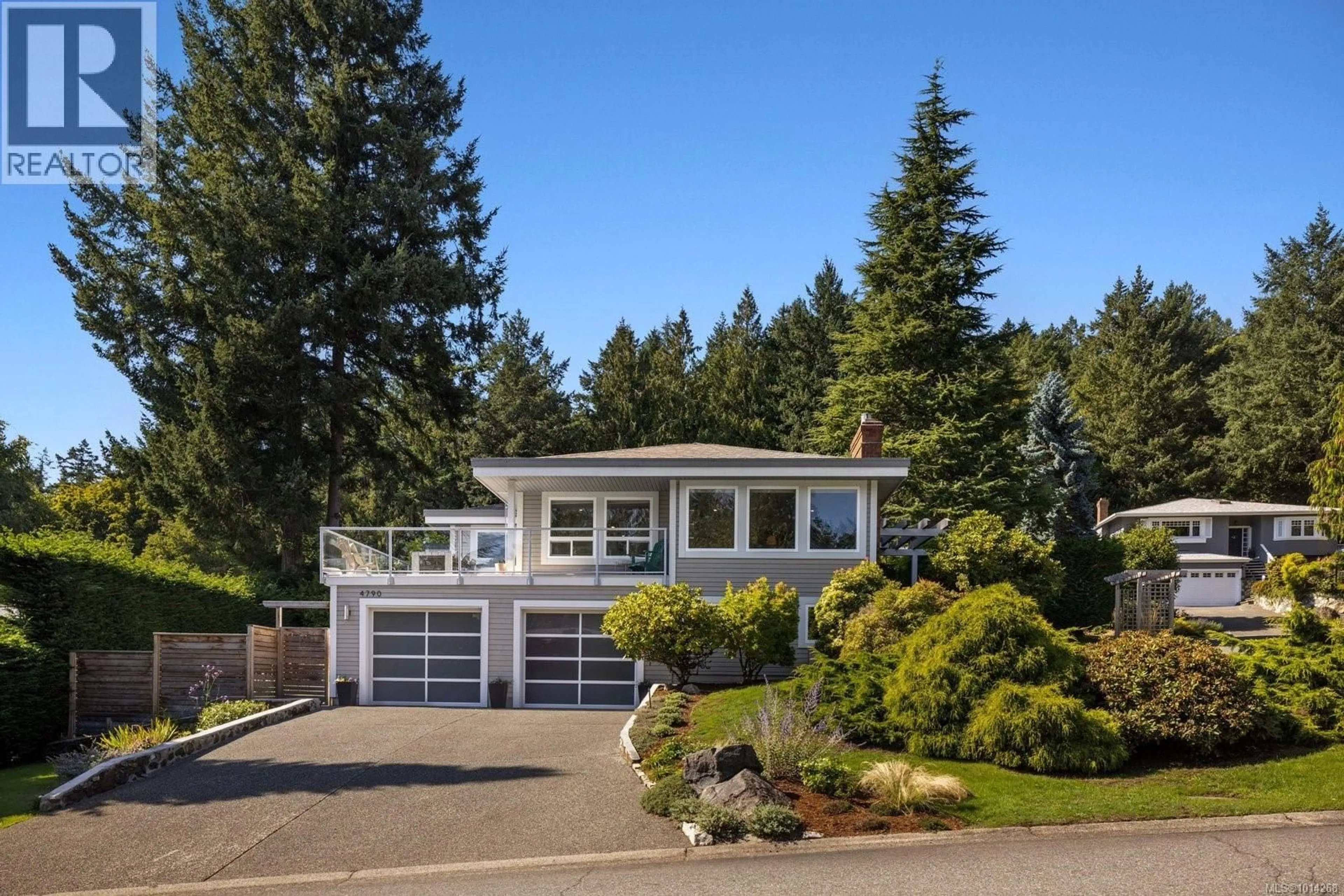Home with vinyl exterior material, street for 4790 AMBLEWOOD DRIVE, Saanich British Columbia V8Y2S3