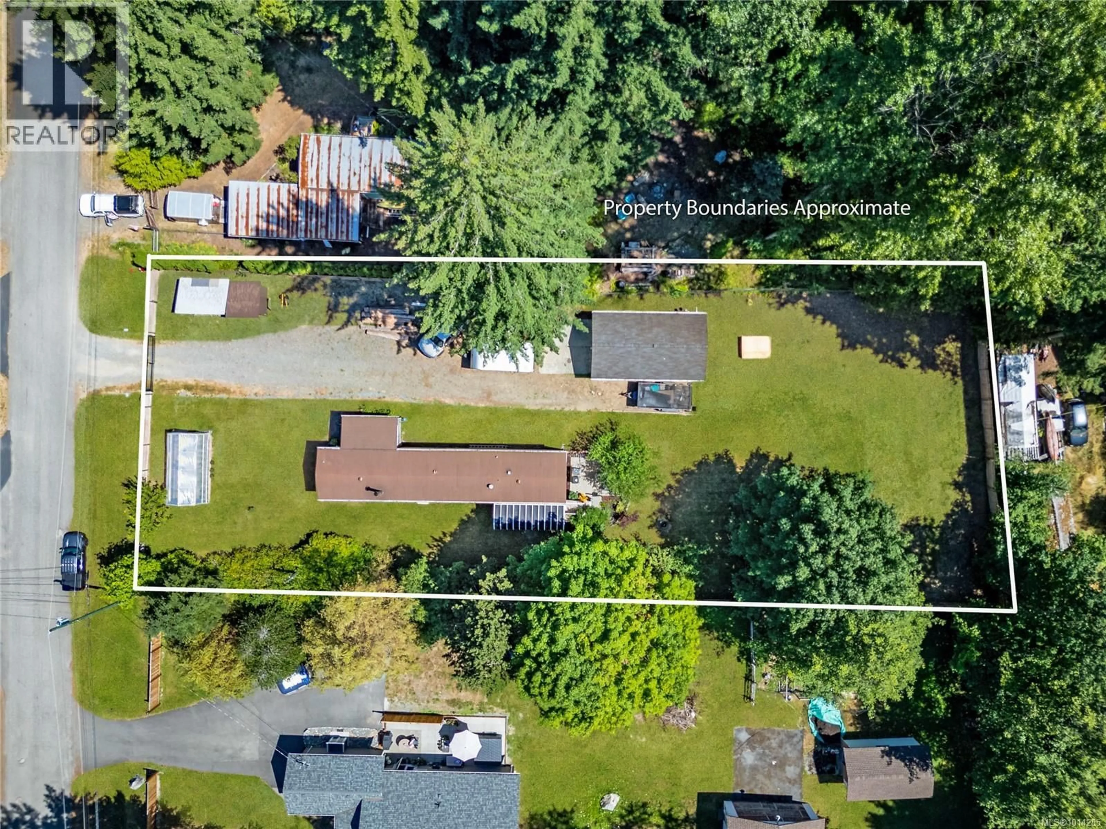 A pic from outside/outdoor area/front of a property/back of a property/a pic from drone, forest/trees view for 2481 OAKES ROAD, Black Creek British Columbia V9J1J1