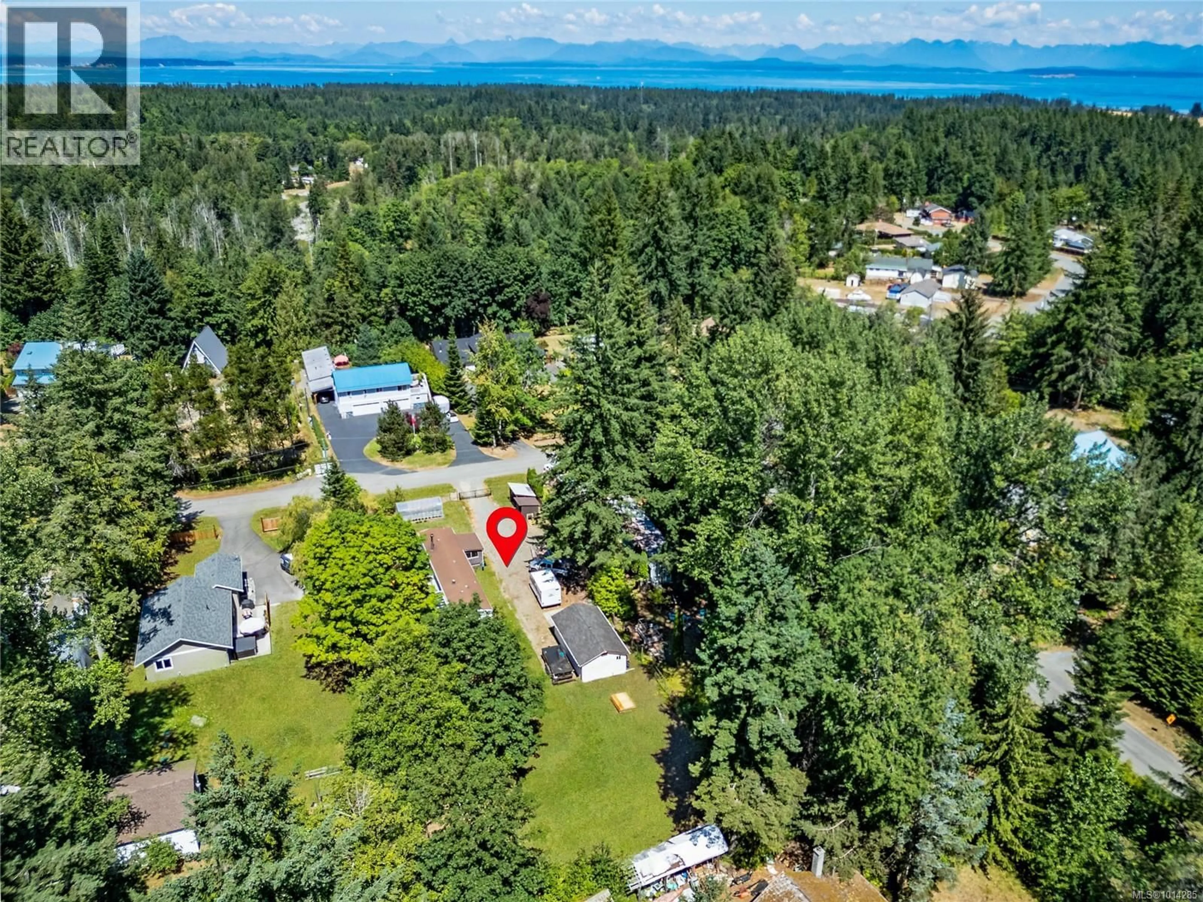 A pic from outside/outdoor area/front of a property/back of a property/a pic from drone, forest/trees view for 2481 OAKES ROAD, Black Creek British Columbia V9J1J1