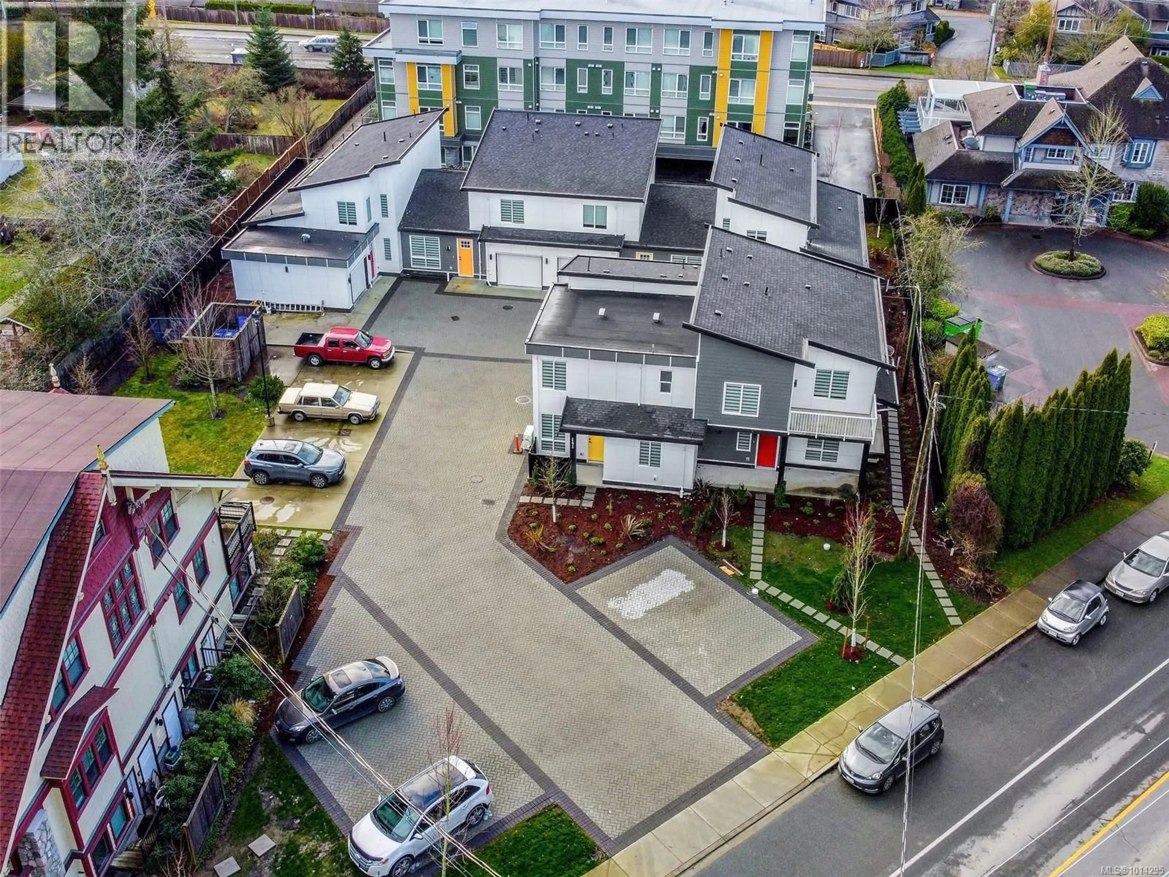 A pic from outside/outdoor area/front of a property/back of a property/a pic from drone, street for 2 - 1171 STELLY'S CROSS ROAD, Central Saanich British Columbia V8M1H4
