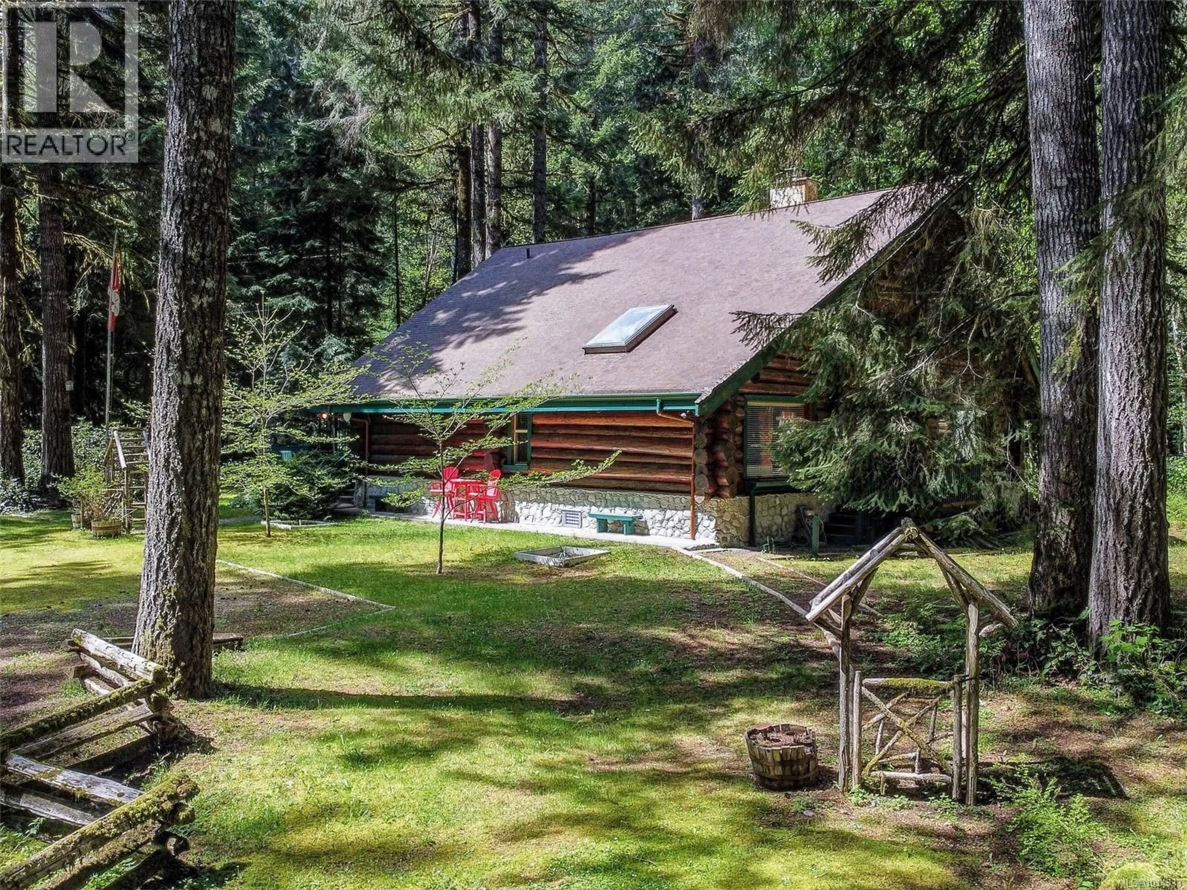 A pic from outside/outdoor area/front of a property/back of a property/a pic from drone, forest/trees view for 7363 WALTON ROAD, Honeymoon Bay British Columbia V0R1Y0