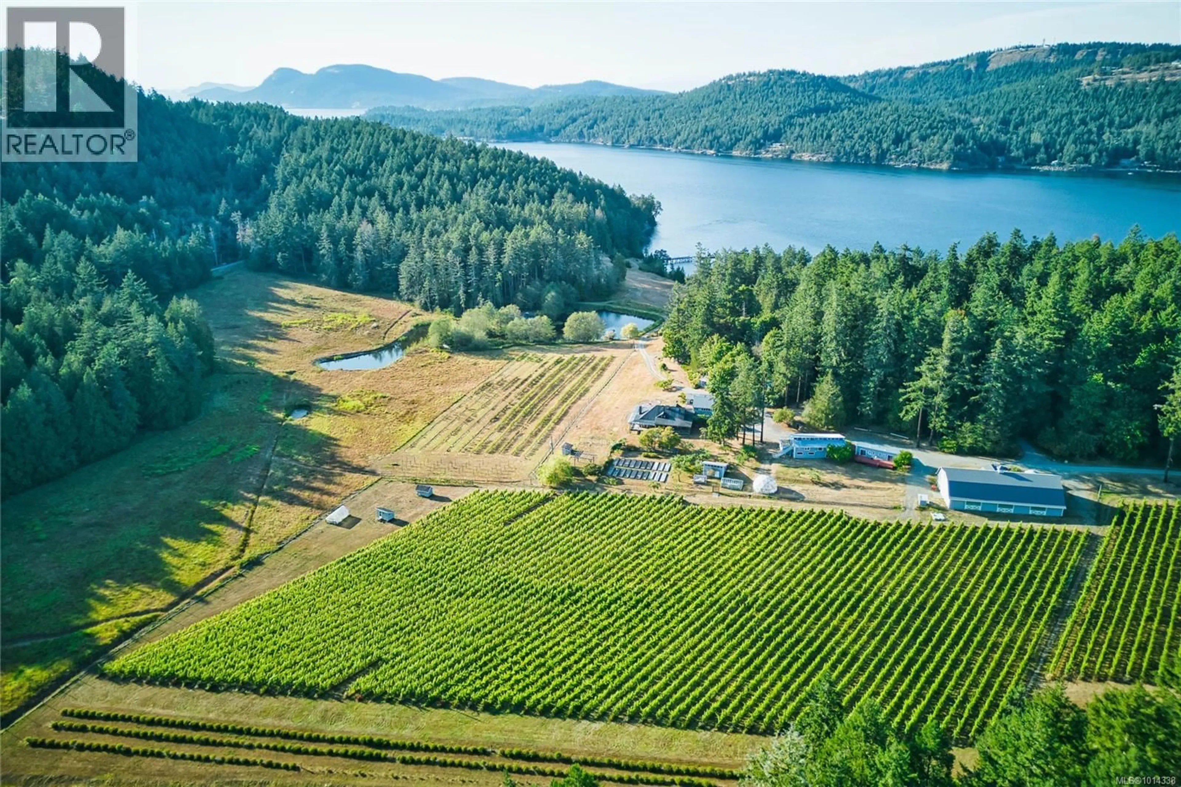 A pic from outside/outdoor area/front of a property/back of a property/a pic from drone, water/lake/river/ocean view for 3200 CLAM BAY ROAD, Pender Island British Columbia V0M2M1