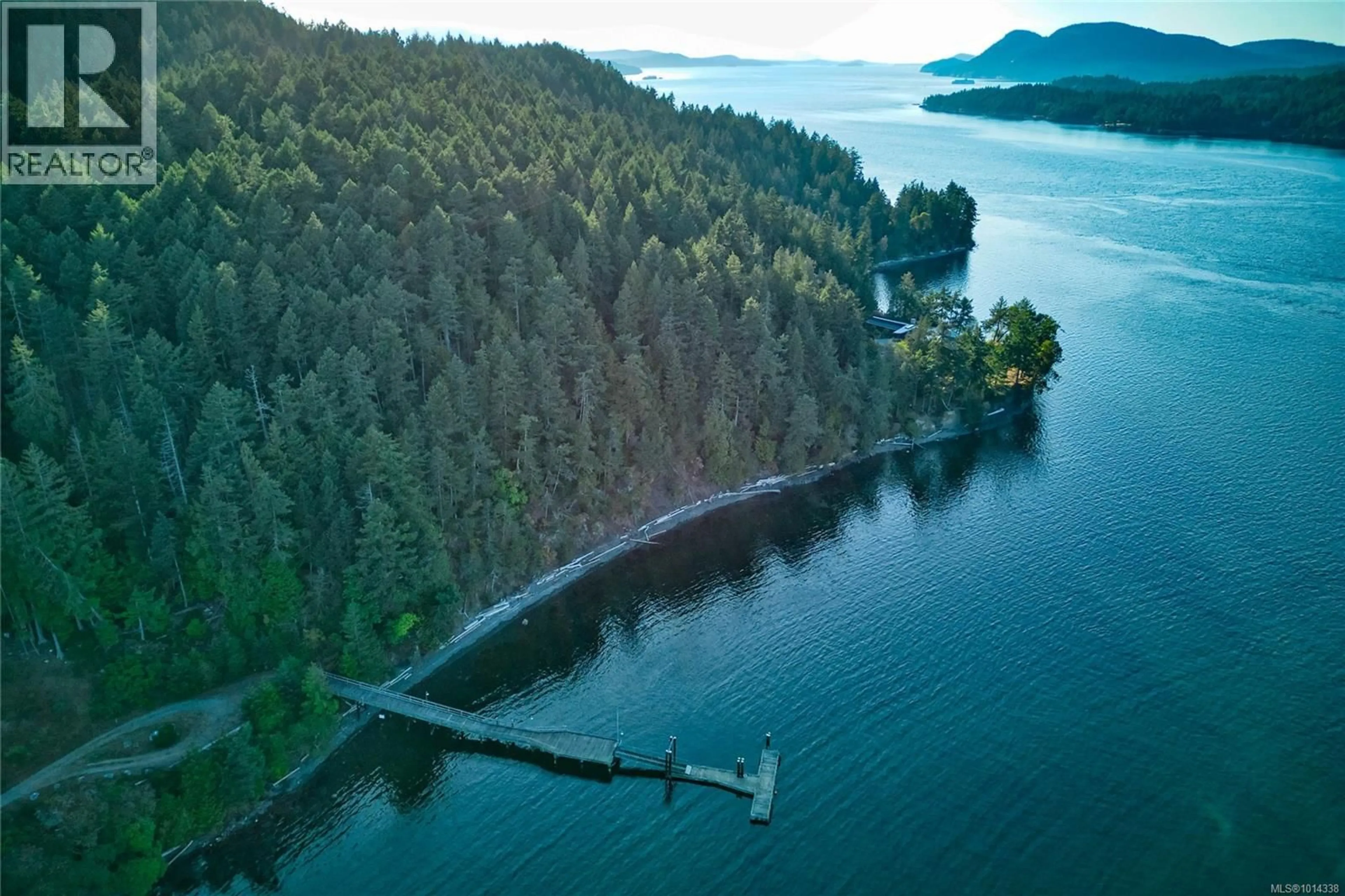 A pic from outside/outdoor area/front of a property/back of a property/a pic from drone, water/lake/river/ocean view for 3200 CLAM BAY ROAD, Pender Island British Columbia V0M2M1