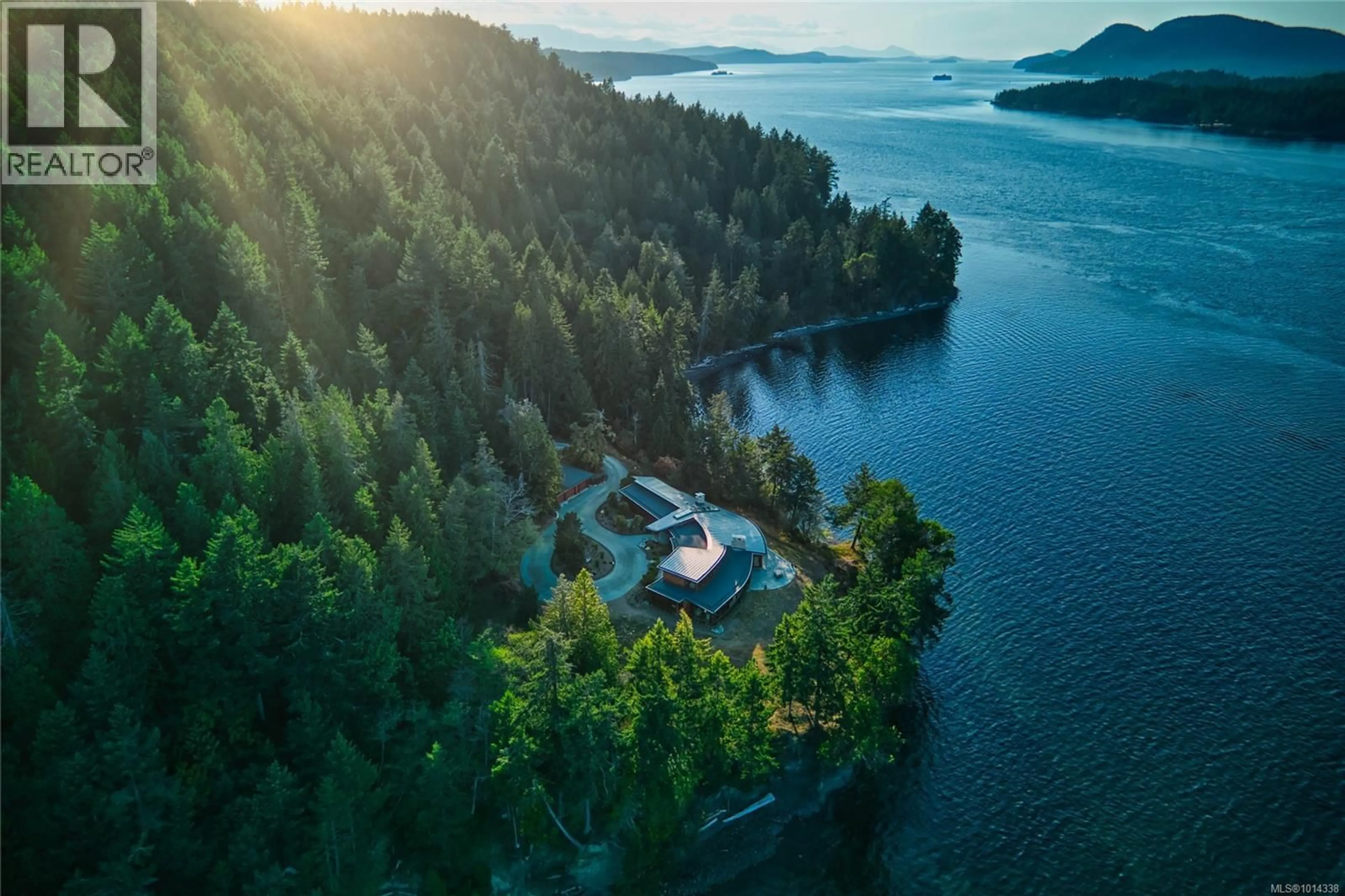 A pic from outside/outdoor area/front of a property/back of a property/a pic from drone, water/lake/river/ocean view for 3200 CLAM BAY ROAD, Pender Island British Columbia V0M2M1