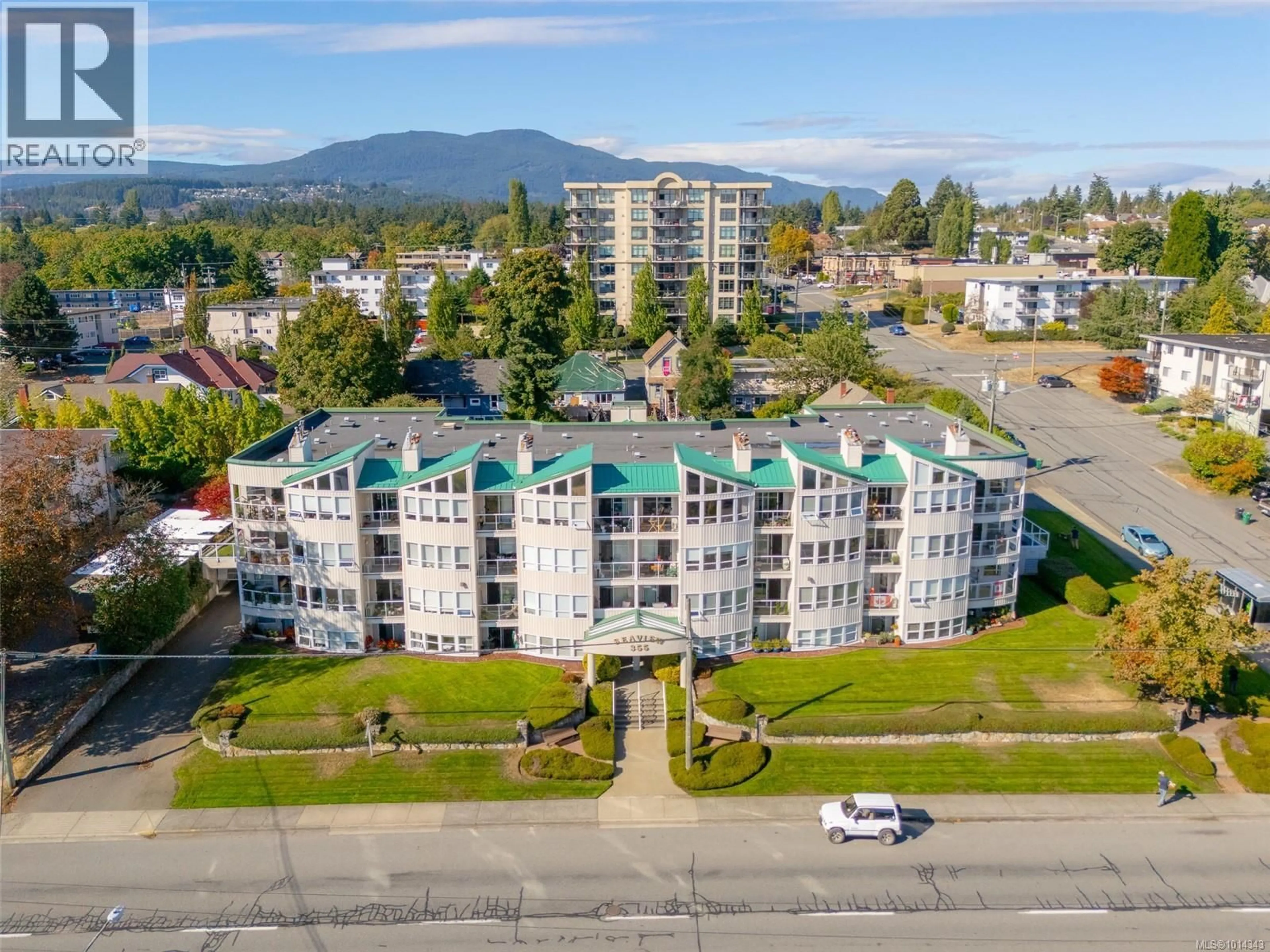A pic from outside/outdoor area/front of a property/back of a property/a pic from drone, mountain view for 401 - 355 STEWART AVENUE, Nanaimo British Columbia V9S4C5