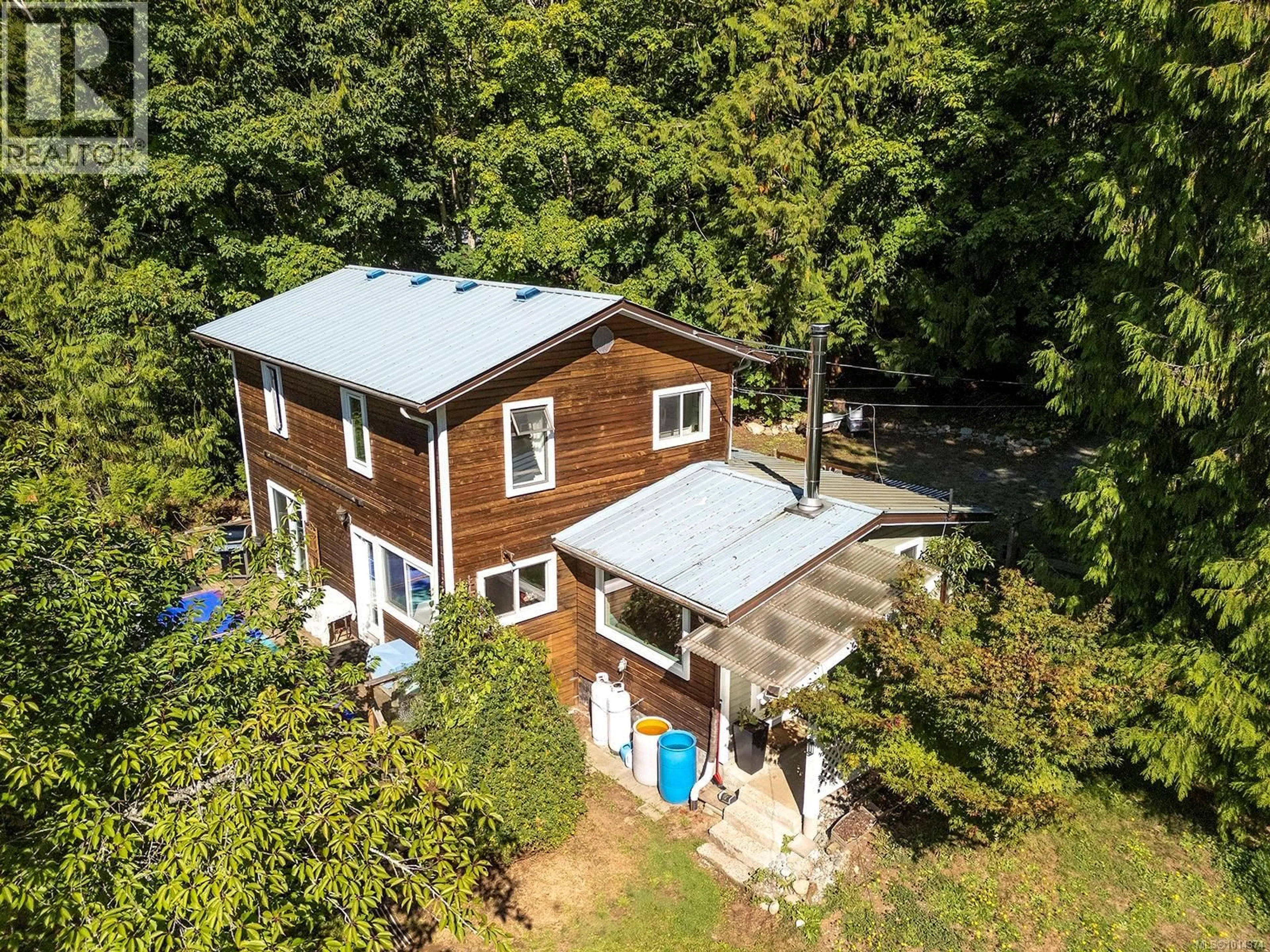A pic from outside/outdoor area/front of a property/back of a property/a pic from drone, building for 4256 MACAULAY ROAD, Black Creek British Columbia V9J1E1