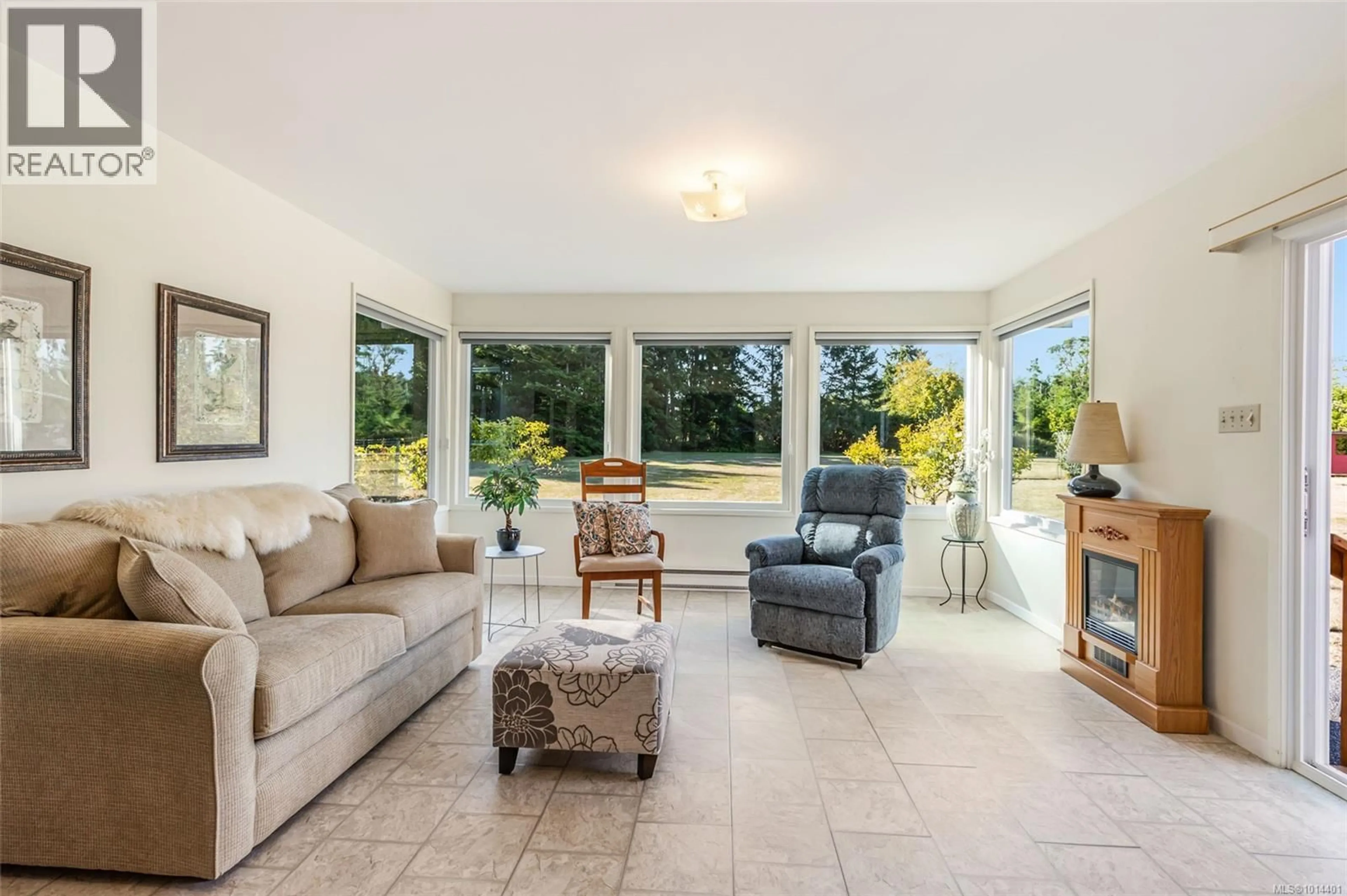 Living room with furniture, ceramic/tile floor for 2402 CROSS ROAD, Nanoose Bay British Columbia V9P9E6