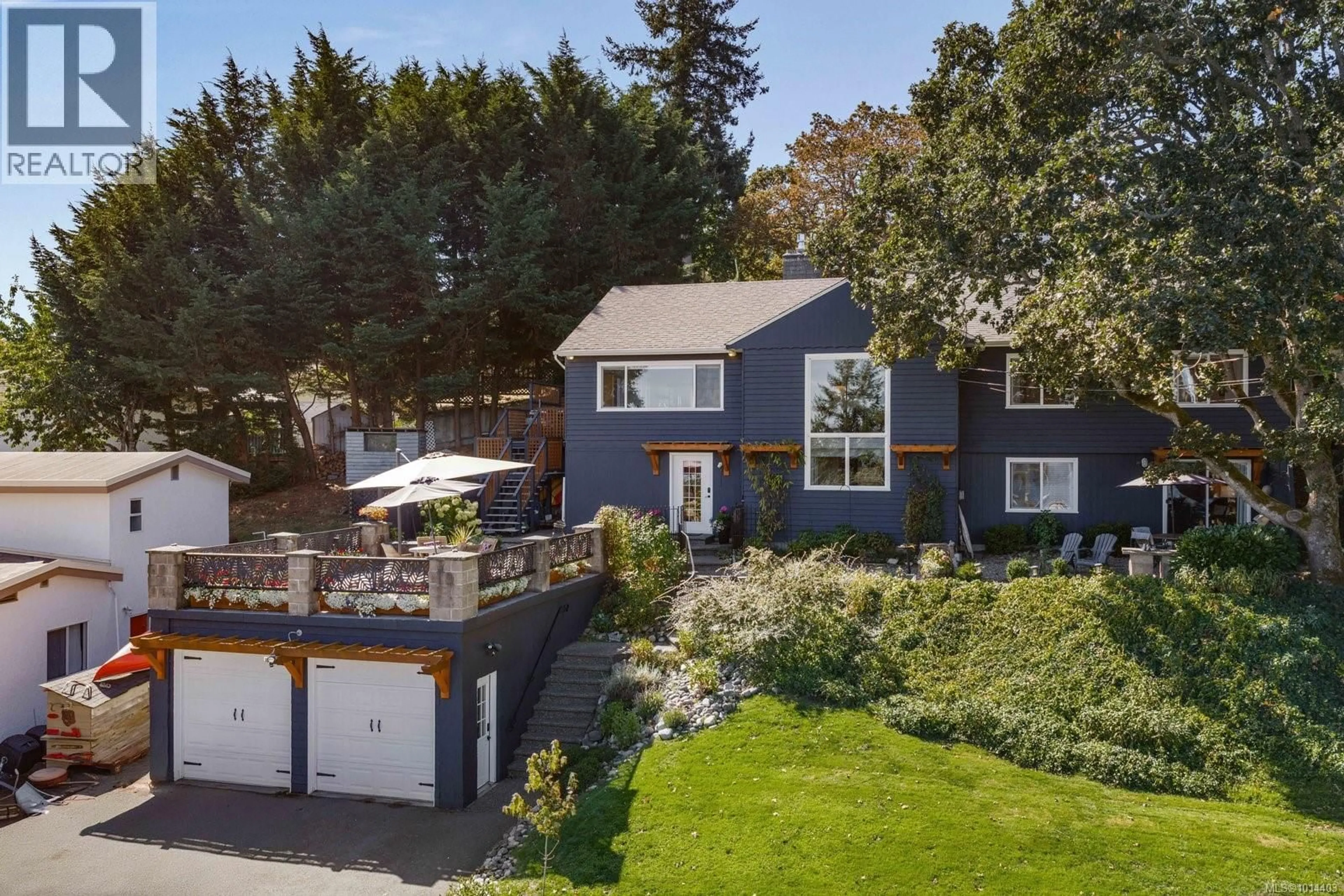 A pic from outside/outdoor area/front of a property/back of a property/a pic from drone, street for 303 MILBURN DRIVE, Colwood British Columbia V9C1V3