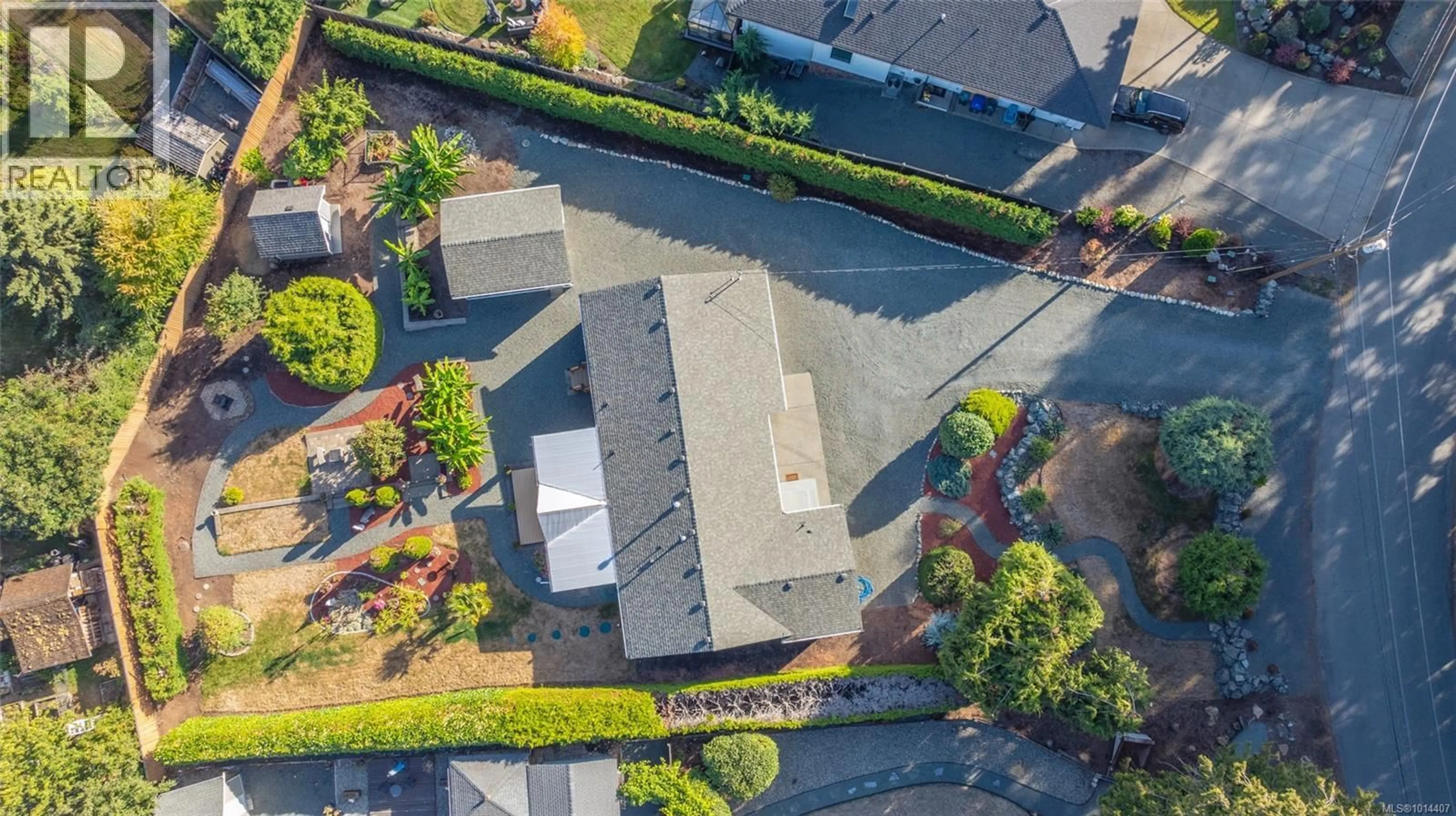 A pic from outside/outdoor area/front of a property/back of a property/a pic from drone, street for 1600 ARBUTUS DRIVE, Nanoose Bay British Columbia V9P9C8