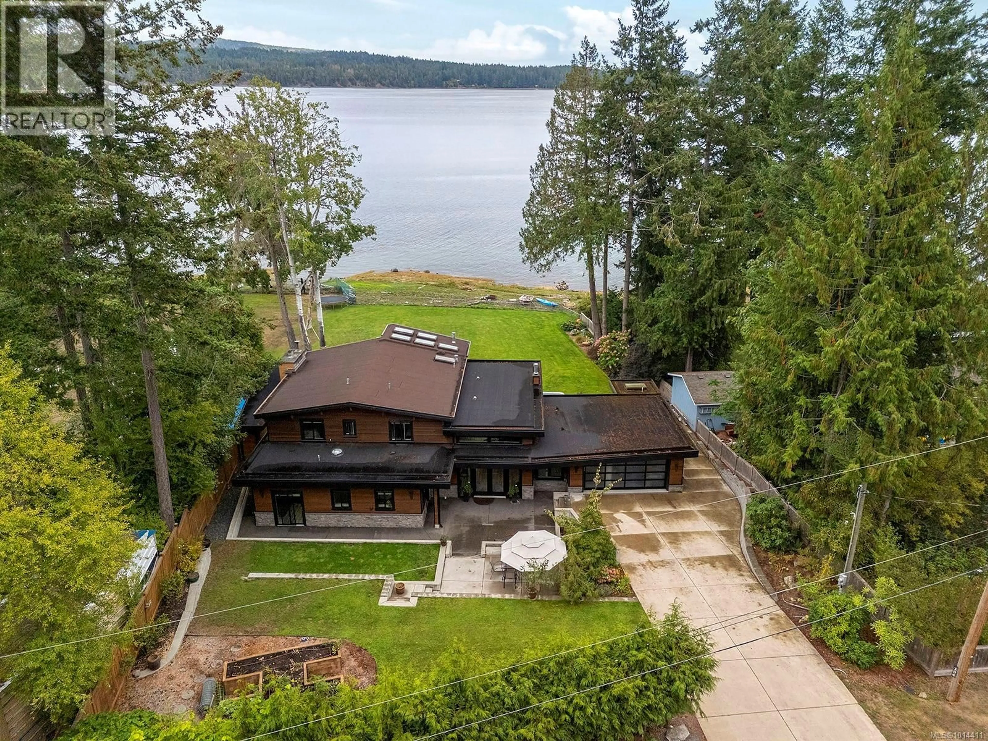 A pic from outside/outdoor area/front of a property/back of a property/a pic from drone, water/lake/river/ocean view for 154 BAYNES DRIVE, Fanny Bay British Columbia V0R1W0