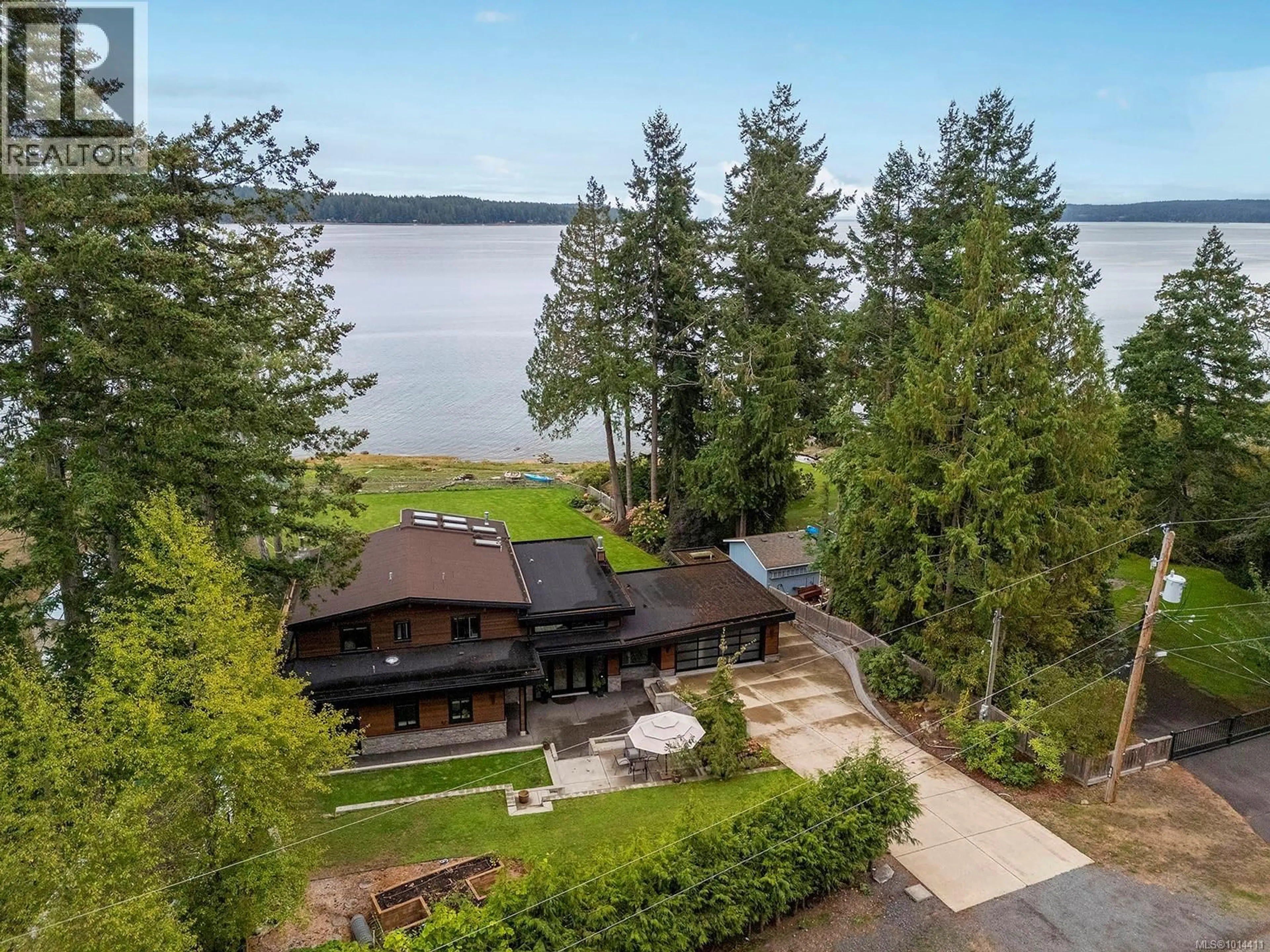 A pic from outside/outdoor area/front of a property/back of a property/a pic from drone, water/lake/river/ocean view for 154 BAYNES DRIVE, Fanny Bay British Columbia V0R1W0